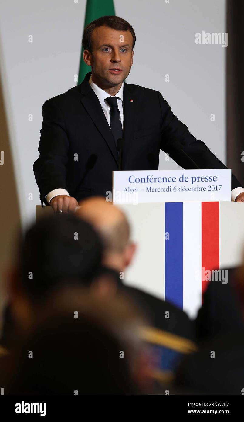 (171206) -- ALGIERS, Dec. 6, 2017 () -- Visiting French President Emmanuel Macron addresses a news conference in Algiers, Algeria, on Dec. 6, 2017. Visiting French President Emmanuel Macron said Wednesday that France does not support U.S. President Donald Trump s unilateral decision to recognize Jerusalem as the capital of Israel. The decision is unilateral and regrettable, and France does not support it, Macron told a news conference in Algiers after his one-day visit to the North African nation. () ALGERIA-ALGIERS-FRANCE-PRESIDENT-MACRON-U.S.-PRESIDENT-TRUMP-JERUSALEM Xinhua PUBLICATIONxNOTx Stock Photo