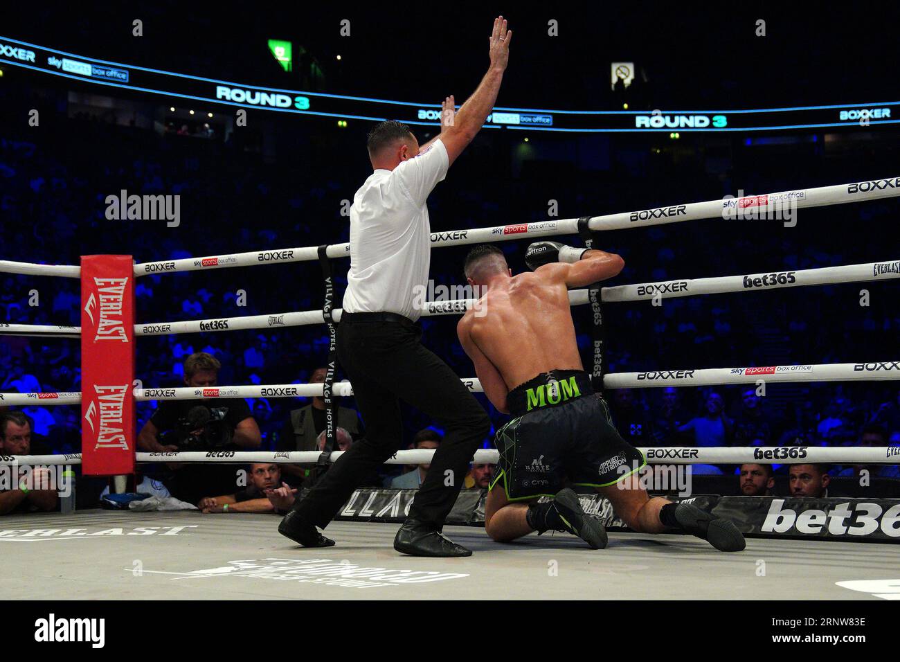 The ring referee stops the fight after Jack Cullen (not pictured