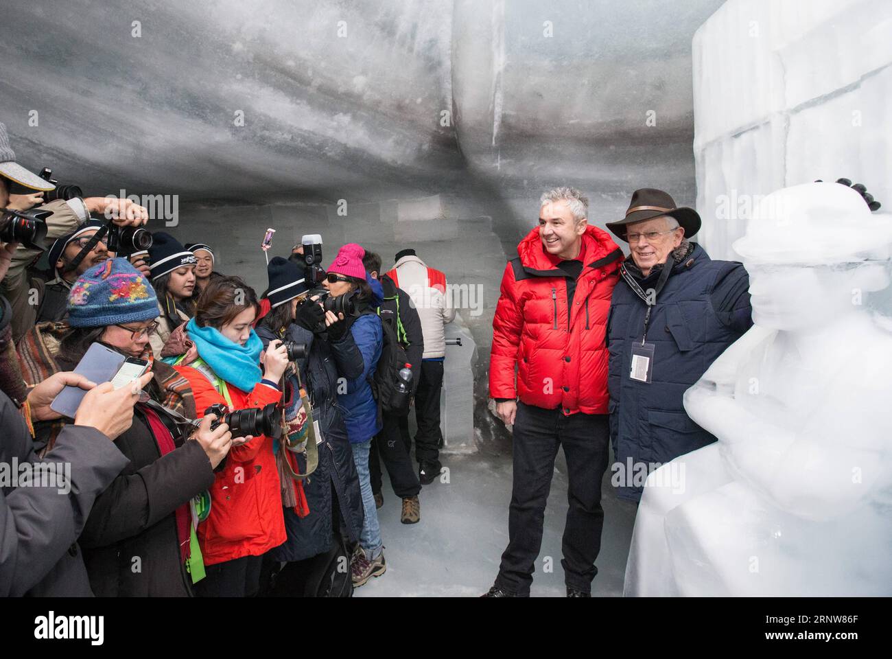 (171207) -- INTERLAKEN (SWITZERLAND), Dec. 7, 2017 -- Eugene Chaplin (1st R), son of screen legend Charlie Chaplin, attends the unveiling ceremony of ice sculpture of Chaplin on the Jungfraujoch saddle, near Interlaken, Switzerland, Dec. 7, 2017. The ice sculpture was made to mark the 40th anniversary of Charlie Chaplin s death. ) SWITZERLAND-INTERLAKEN-CHAPLIN-ICE SCULPTURE-UNVEILING XuxJinquan PUBLICATIONxNOTxINxCHN Stock Photo