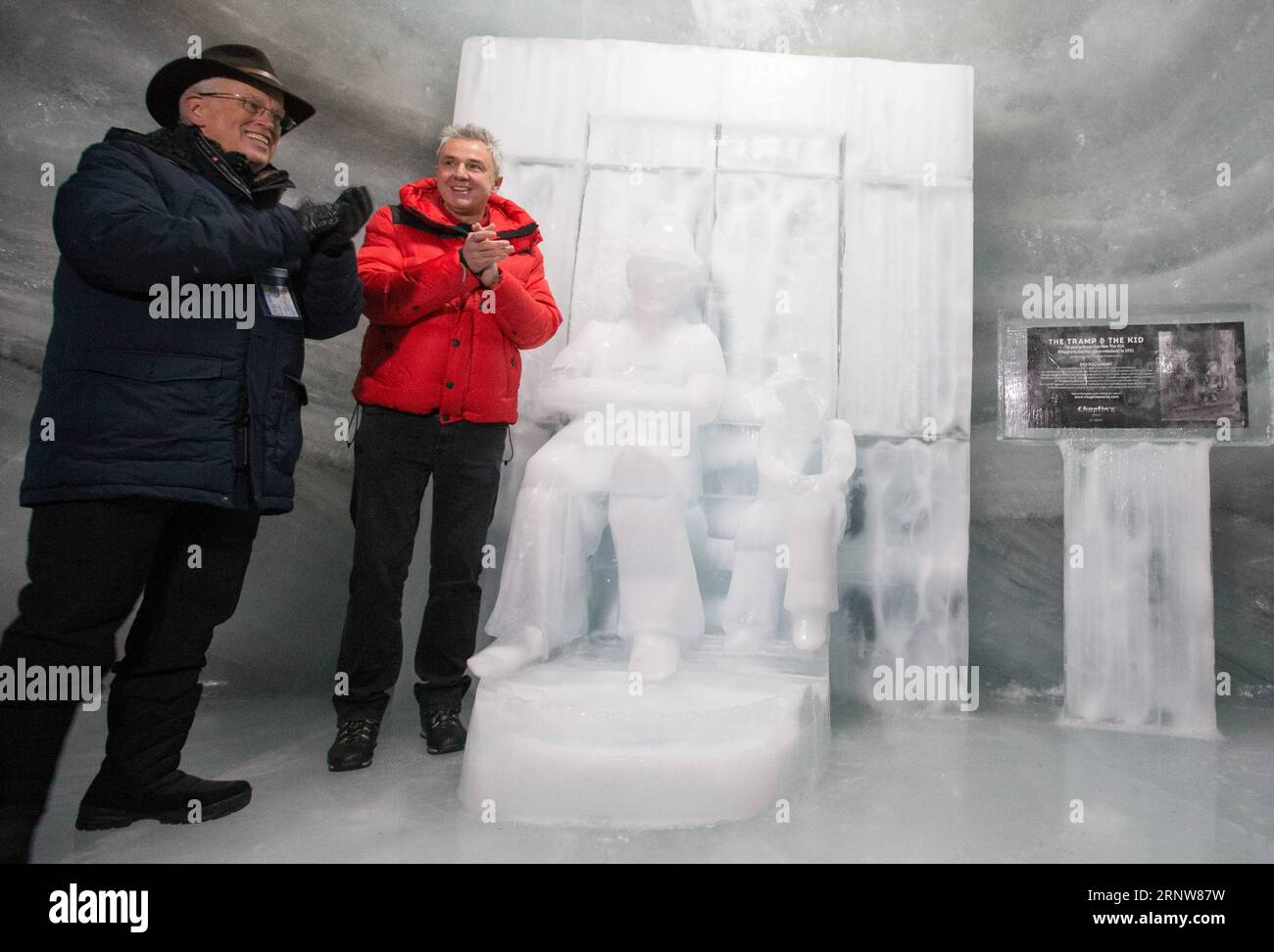 (171207) -- INTERLAKEN (SWITZERLAND), Dec. 7, 2017 -- Eugene Chaplin (L), son of screen legend Charlie Chaplin, attends the unveiling ceremony of ice sculpture of Chaplin on the Jungfraujoch saddle, near Interlaken, Switzerland, Dec. 7, 2017. The ice sculpture was made to mark the 40th anniversary of Charlie Chaplin s death. ) SWITZERLAND-INTERLAKEN-CHAPLIN-ICE SCULPTURE-UNVEILING XuxJinquan PUBLICATIONxNOTxINxCHN Stock Photo
