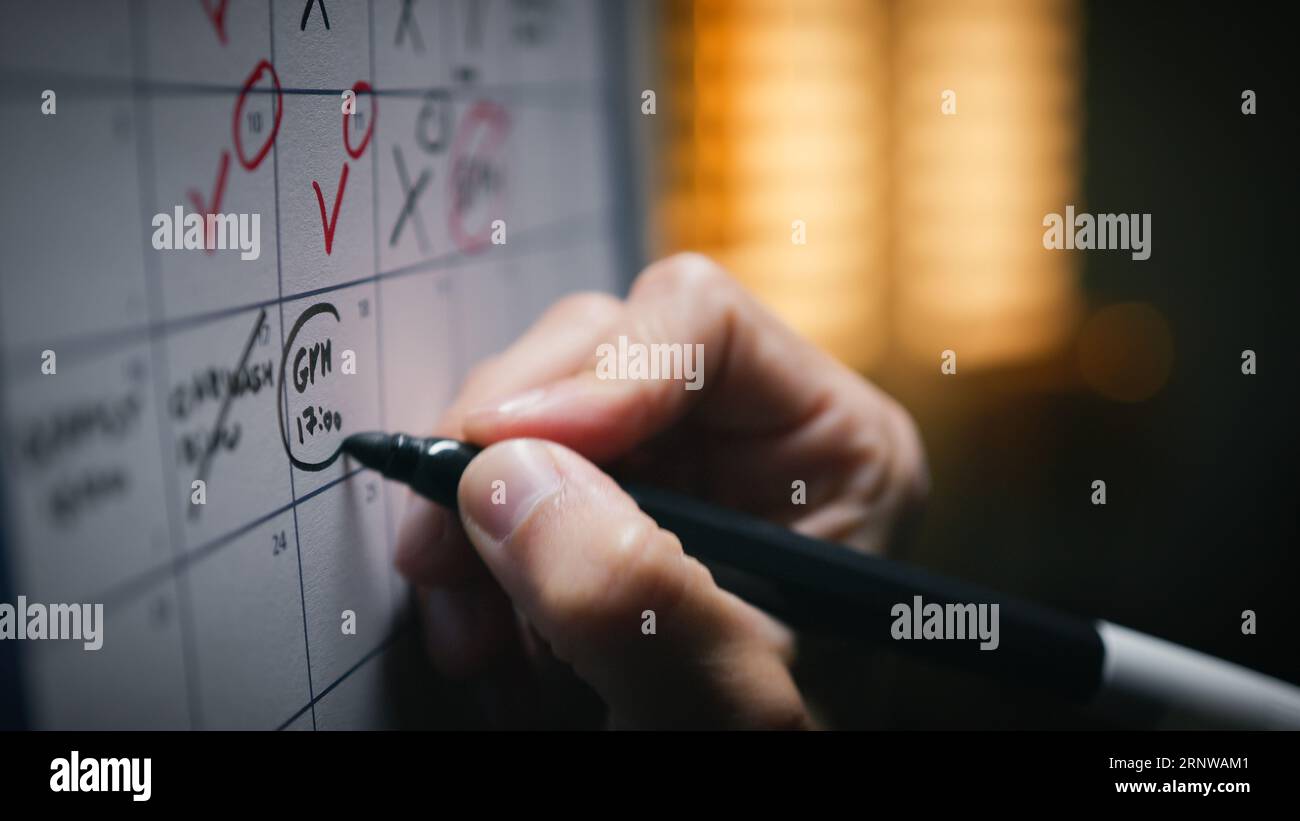 Cross out calendar appointments on a calendar Stock Photo Alamy Cross out calendar appointments on a calendar Stock Photo Alamy
