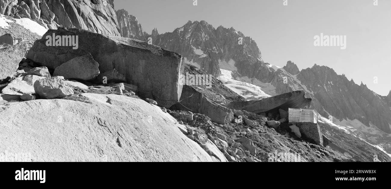 The panorama with the old chalet Refuge du Couvercle over the Mer de Glace glacier. Stock Photo