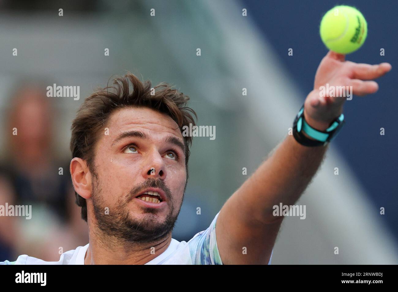 Stan Wawrinka, of Switzerland, serves to Jannik Sinner, of Italy, during the third round of the U.S. Open tennis championships, Saturday, Sept