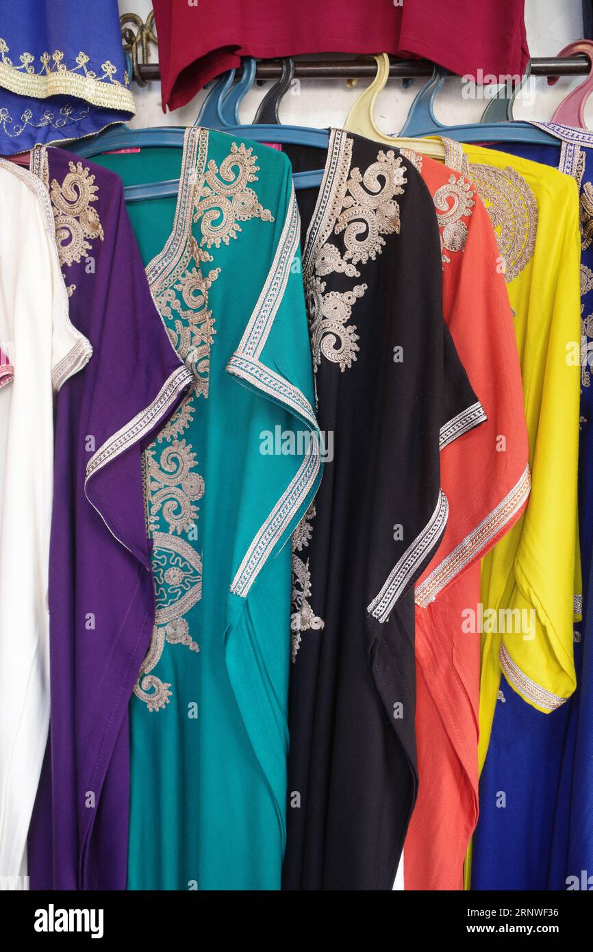 Long colourful dresses hi-res stock photography and images - Alamy