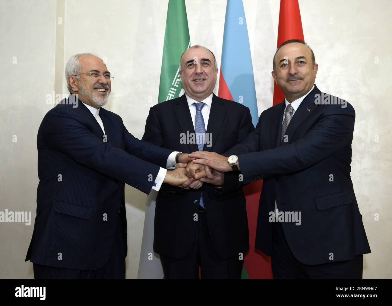 Bilder des Tages (171220) -- BAKU, Dec 20, 2017 -- Azerbaijani Foreign Minister Elmar Mammadyarov (C),Turkish Foreign Minister Mevlut Cavusoglu (R) and Iranian Foreign Minister Mohammad Javad Zarif shake hands before the fifth trilateral meeting of Azerbaijani, Iranian and Turkish Foreign Ministers in Baku, Azerbaijan, Dec 20, 2017.) AZERBAIJAN-BAKU-TRILATERAL FM MEETING TofikxBabayev PUBLICATIONxNOTxINxCHN Stock Photo