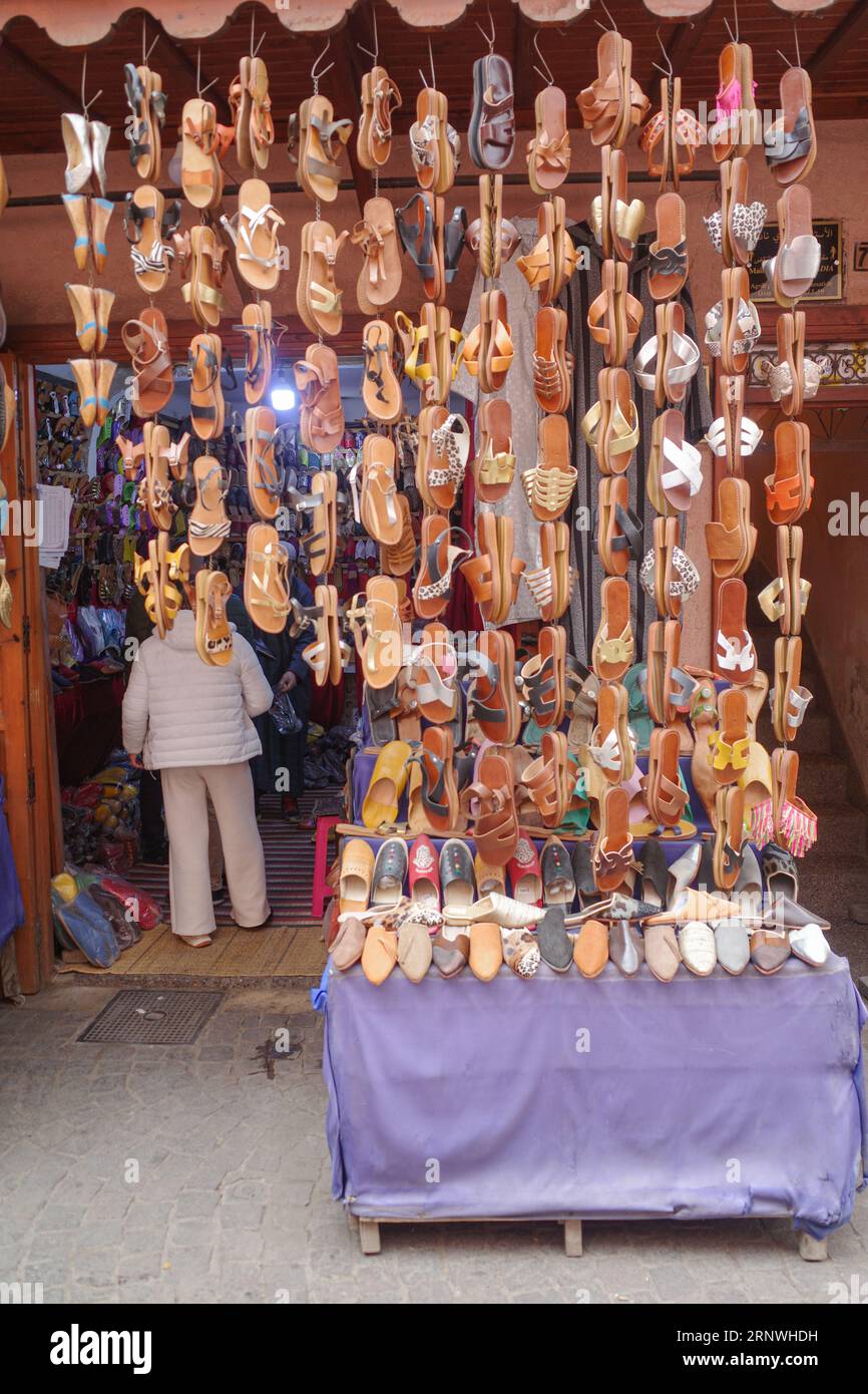 Marrakech, Morocco - Feb 25, 2023: Traditional Moroccan leather sandals on sale in the Marrakech Medina market Stock Photo