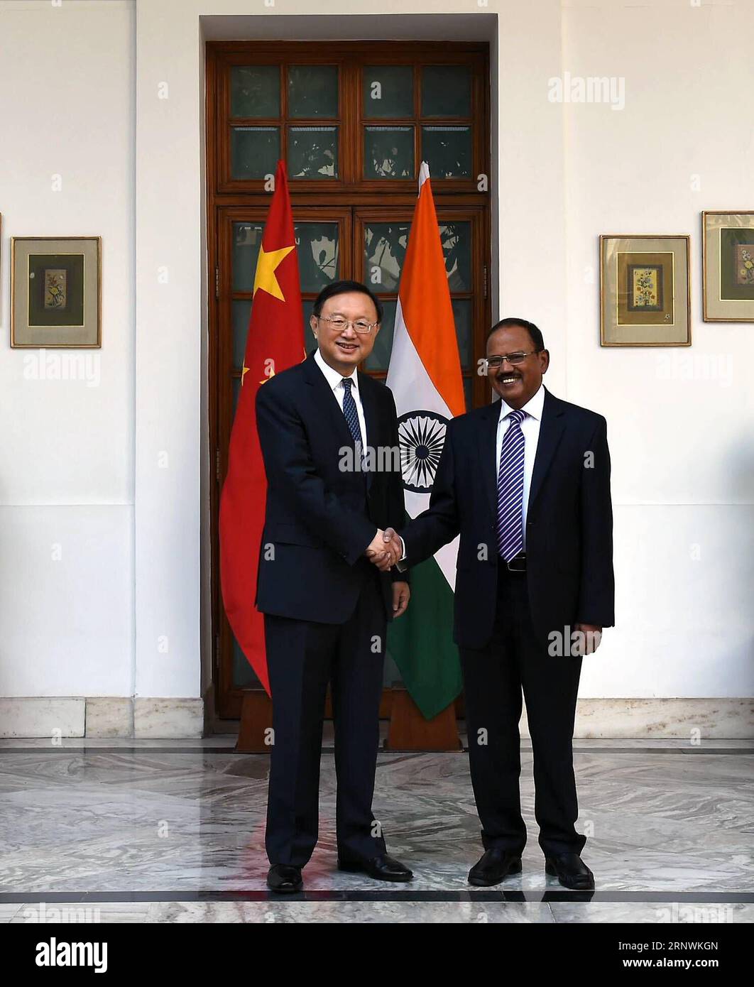(171223) -- NEW DELHI, Dec. 23, 2017 -- Chinese State Councilor Yang Jiechi (L) shakes hands with Indian National Security Adviser Ajit Doval in New Delhi, India, Dec. 22, 2017. Senior officials of China and India have agreed to properly handle border issues so as to jointly safeguard peace and tranquility in their border areas. ) (srb) INDIA-NEW DELHI-CHINA-BILATERAL RELATIONS ZhangxNaijie PUBLICATIONxNOTxINxCHN Stock Photo