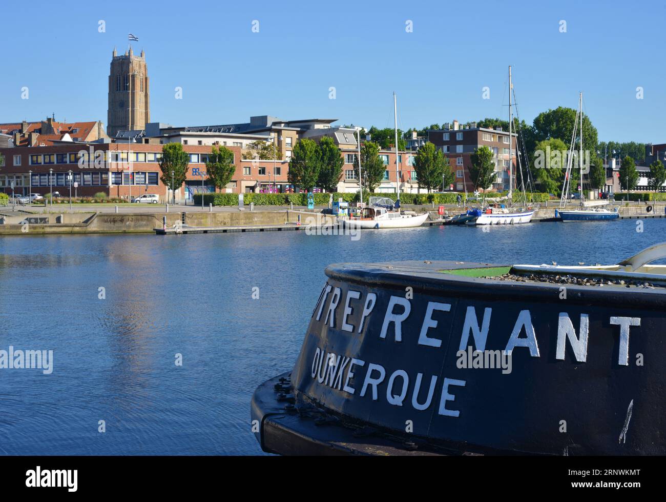 Dunkerque, France 07-19-2016 port, vessels and view to the Saint Eloi church Stock Photo