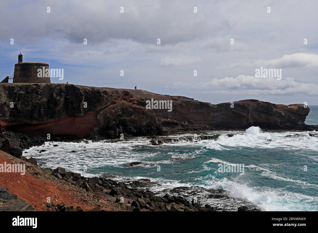 Crashing Atlantic waves, along the desolate coast at Torre Del Aguila-Castillo De Las Coloradas area, Lanzarote, Canary Islands, Spain Stock Photo