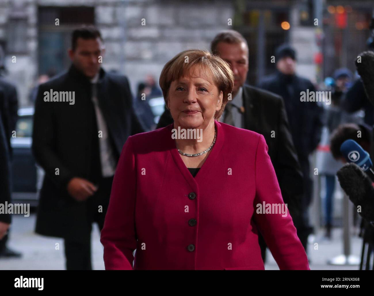 (180107) -- BERLIN, Jan. 7, 2018 -- German Chancellor and leader of German Christian Democratic Union (CDU) Angela Merkel goes to attend the exploratory talks for a new coalition government between the CDU, Christian Social Union (CSU) and the Social Democratic Party (SPD) at the headquarters of SPD in Berlin, capital of Germany, on Jan. 7, 2018. ) (zxj) GERMANY-BERLIN-COALITION GOVERNMENT-EXPLORATARY TALKS ShanxYuqi PUBLICATIONxNOTxINxCHN Stock Photo