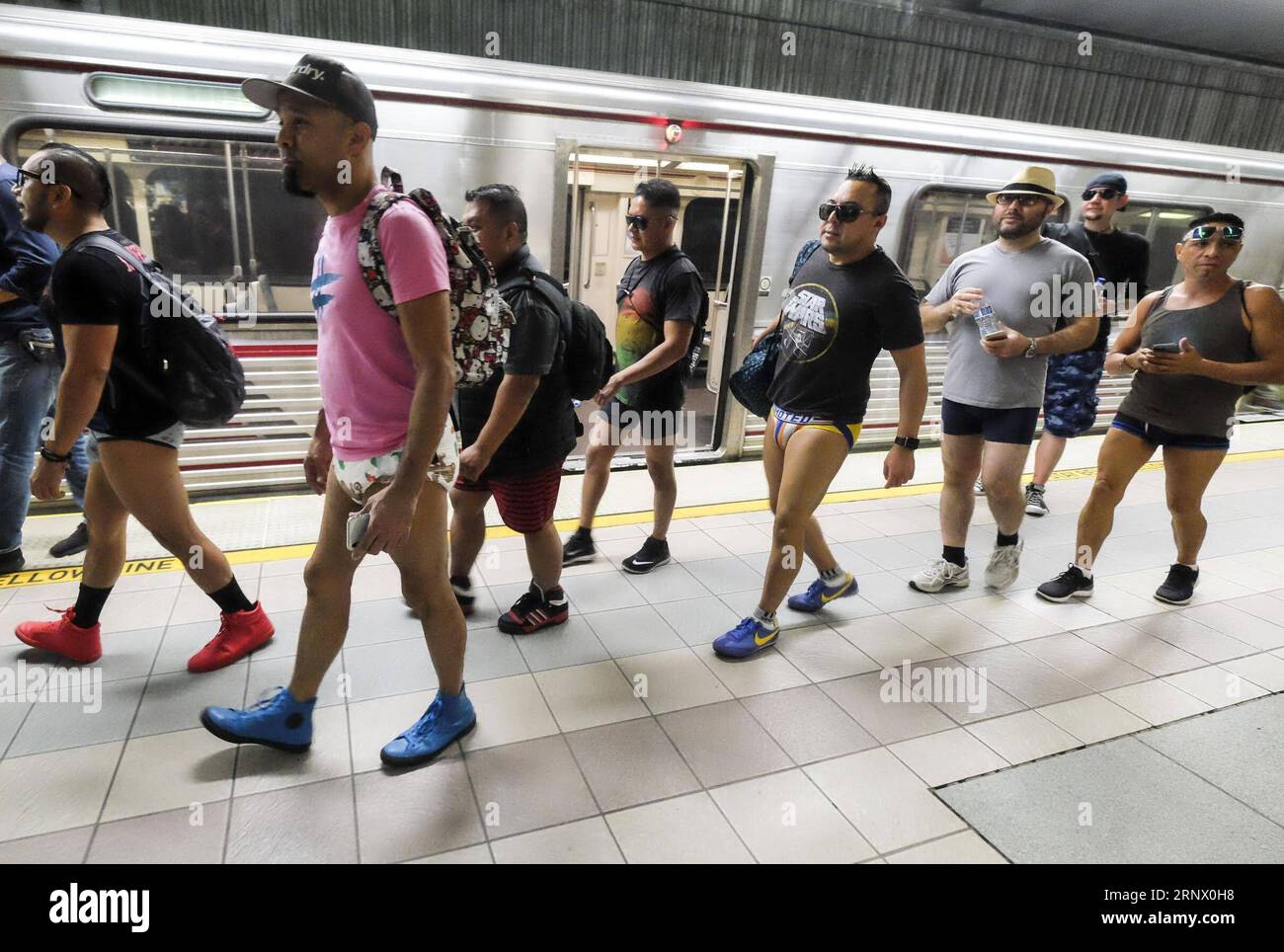 180108-los-angeles-jan-8-2018-participants-in-the-no-pants-subway-ride-are-seen-on-the-metro-in-los-angeles-the-united-states-on-jan-7-2018-the-no-pants-subway-ride-is-an-annual-event-which-started-in-2002-by-improv-everywhere-in-new-york-djj-us-los-angeles-no-pants-subway-zhaoxhanrong-publicationxnotxinxchn-2RNX0H8.jpg