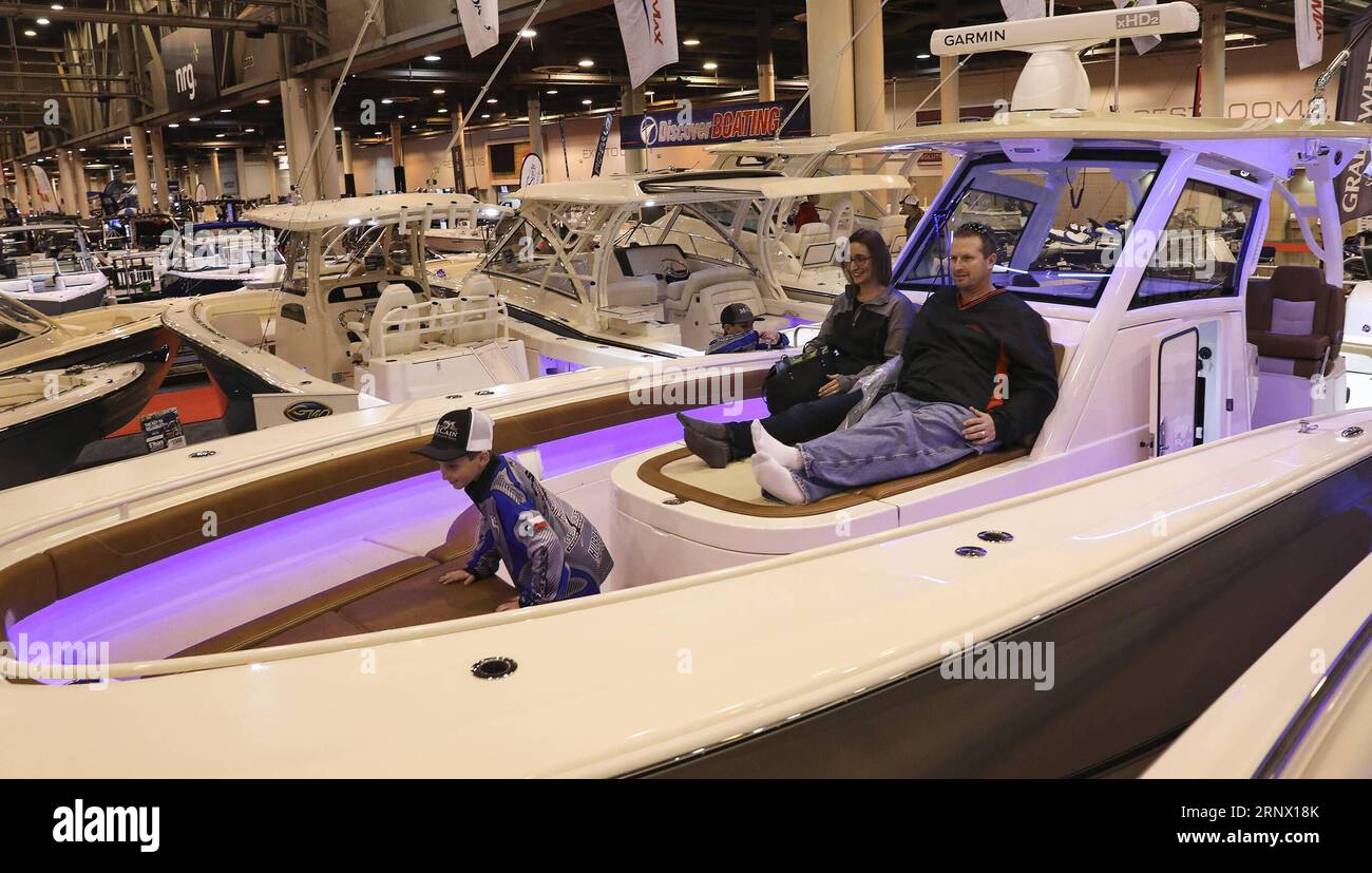 (180109) -- HOUSTON, Jan. 9, 2018 -- People rest on a Boston Whaler boat at the 63rd annual Houston International Boat, Sport and Travel Show in Houston, Texas, the U.S., Jan. 8, 2018. )(yk) U.S.-HOUSTON-BOAT SHOW Yi-ChinxLee PUBLICATIONxNOTxINxCHN Stock Photo