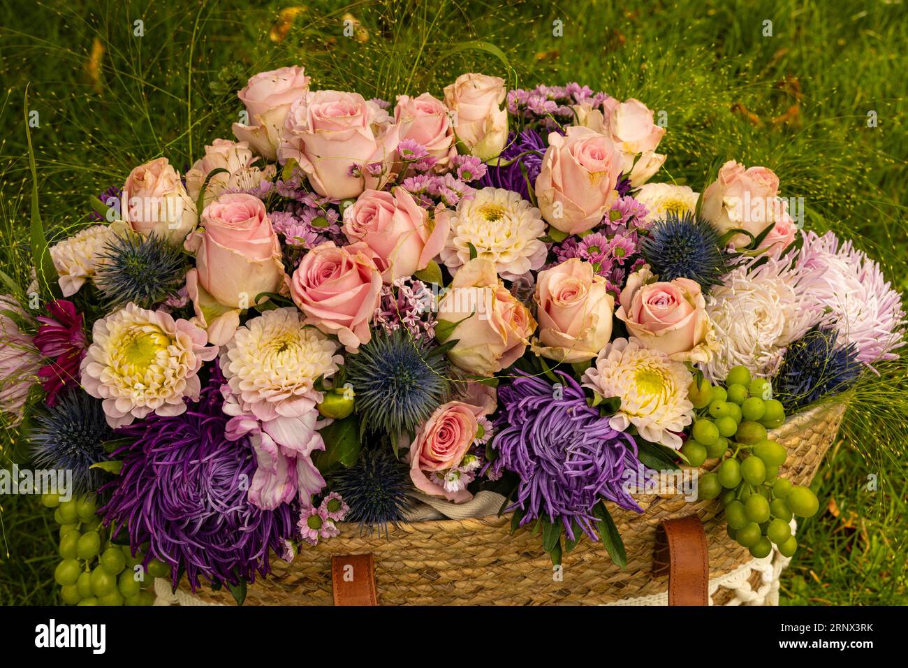 beautiful colorful flower bouquet with roses an other blooms Stock Photo
