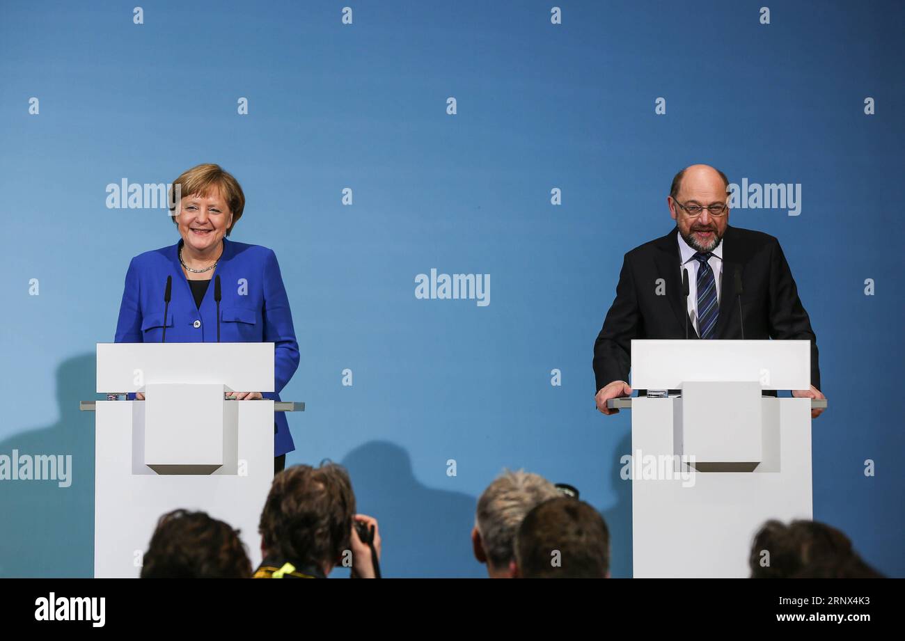 (180112) -- BERLIN, Jan. 12, 2018 -- German Chancellor and leader of German Christian Democratic Union (CDU) Angela Merkel (L) and leader of German Social Democratic Party (SPD) Martin Schulz attend a joint press conference after coalition talks at the headquarters of SPD, in Berlin, Germany, on Jan. 12, 2018. German Chancellor Angela Merkel s conservatives and the Social Democrats (SPD) on Friday achieved a breakthrough in their exploratory talks aimed at forming a new coalition government, local media reported. )(srb) GERMANY-BERLIN-COALITION TALKS-BREAKTHROUGH ShanxYuqi PUBLICATIONxNOTxINxC Stock Photo