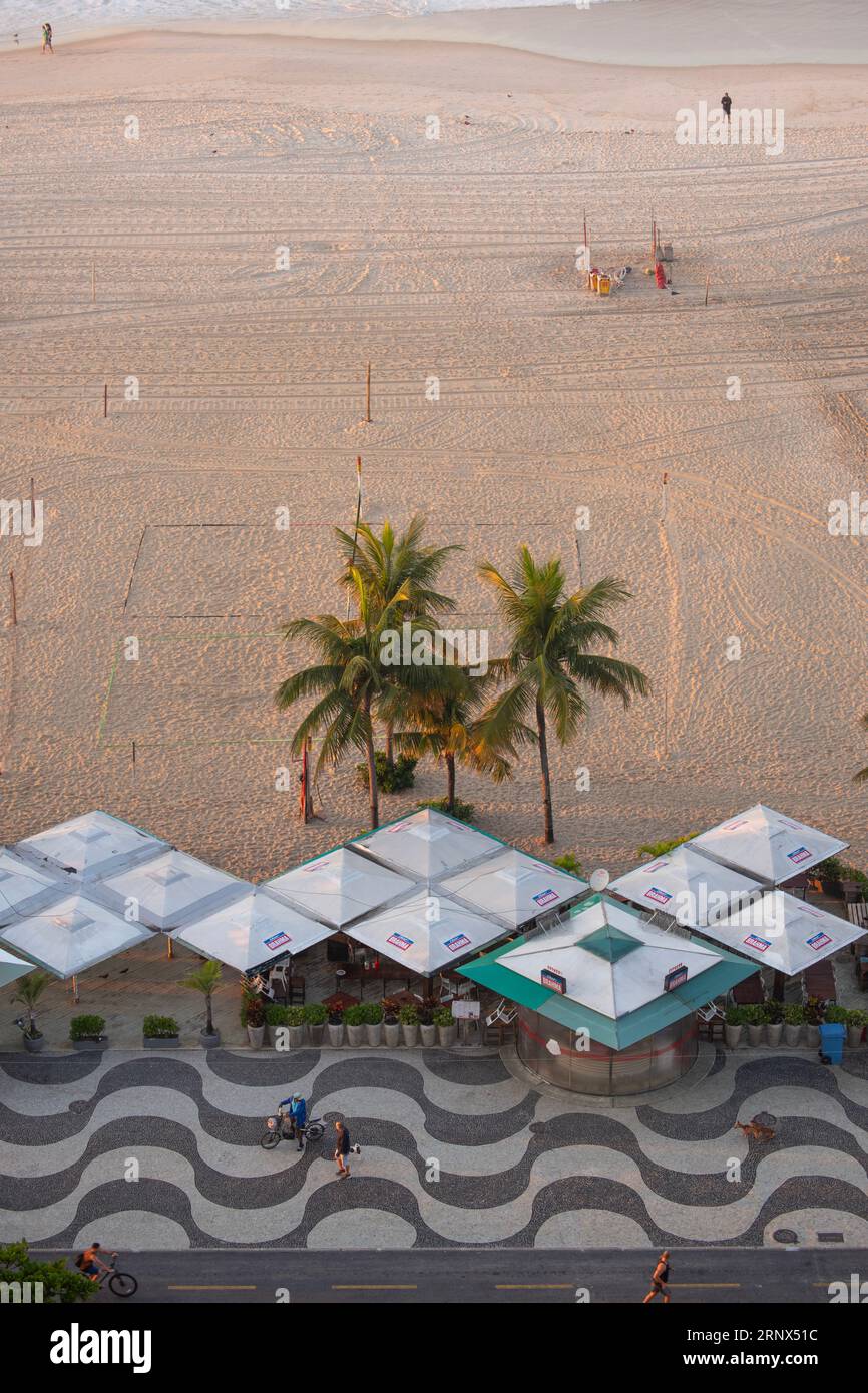 Rio de Janeiro, Brazil: early morning activities on a desert Copacabana ...