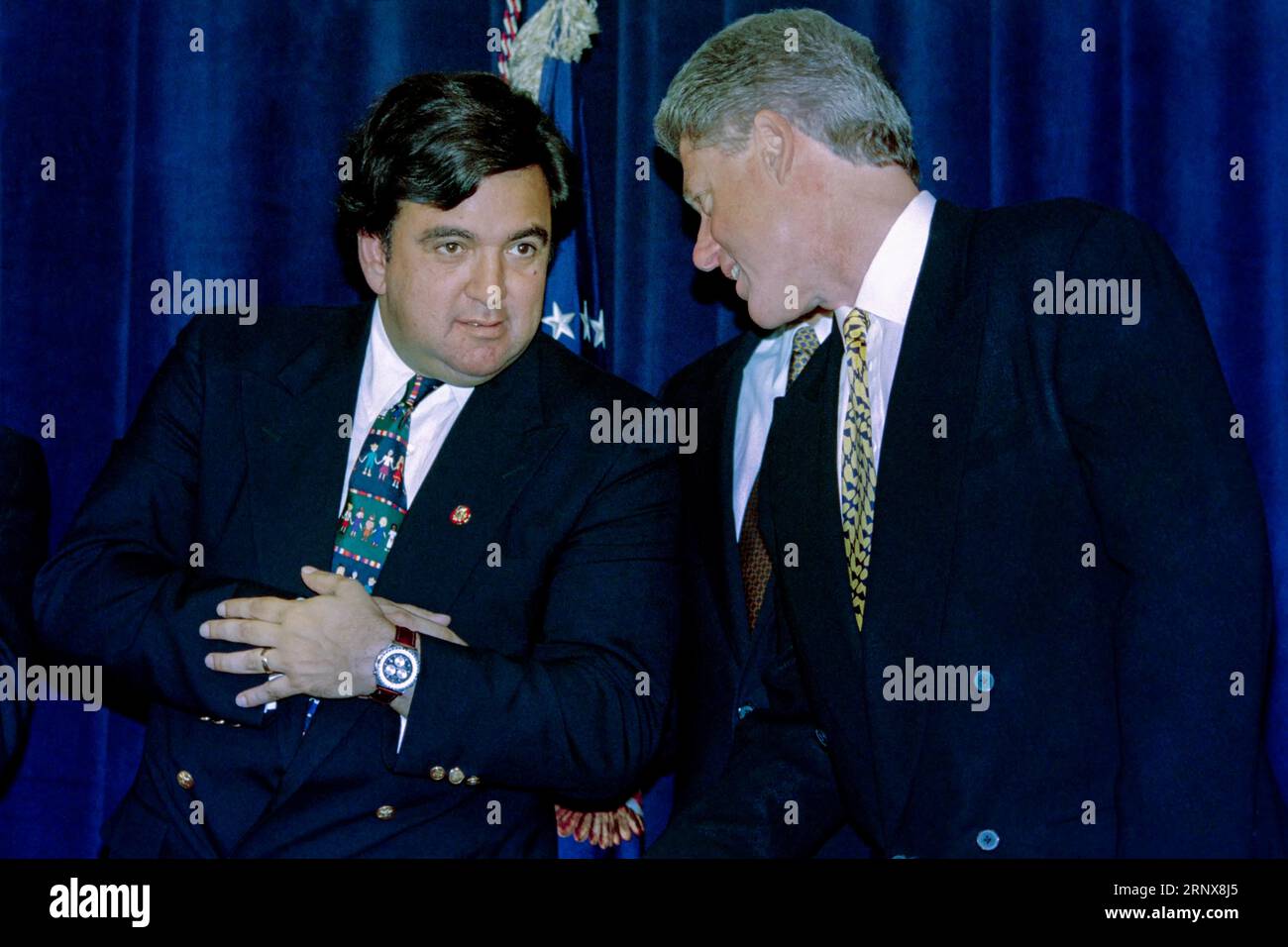 U.S President Bill Clinton, right, speaks with Congressman Bill Richardson, left, during a Cinco de Mayo celebration at the Cineplex Odeon Theatre, May 5, 1995 in Washington, D.C. The Clinton’s attended the premiere of “My Family-Mi Familia” hosted by the National Council of La Rasa and the Congressional Hispanic Caucus. Stock Photo