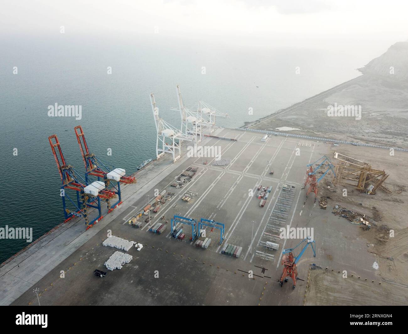 (180129) -- GWADAR, Jan. 29, 2018 -- Photo taken on Jan. 29, 2018 shows a view of Gwadar port in southwest Pakistan s Gwadar. The first phase of Gwadar Port s Free Zone in southwestern Pakistan was inaugurated on Monday by Prime Minister Shahid Khaqan Abbasi, who commented that the free zone would help facilitate regional and global trade under the China-Pakistan Economic Corridor (CPEC). ) (psw) PAKISTAN-GWADAR-FREE ZONE AhmadxKamal PUBLICATIONxNOTxINxCHN Stock Photo
