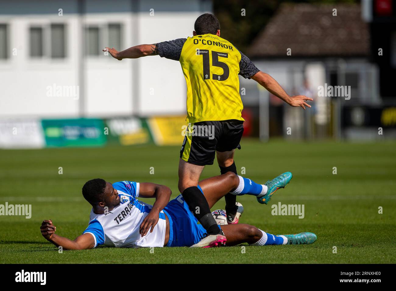 Barrow s Emile Acquah battles with Harrogate Town s Anthony O