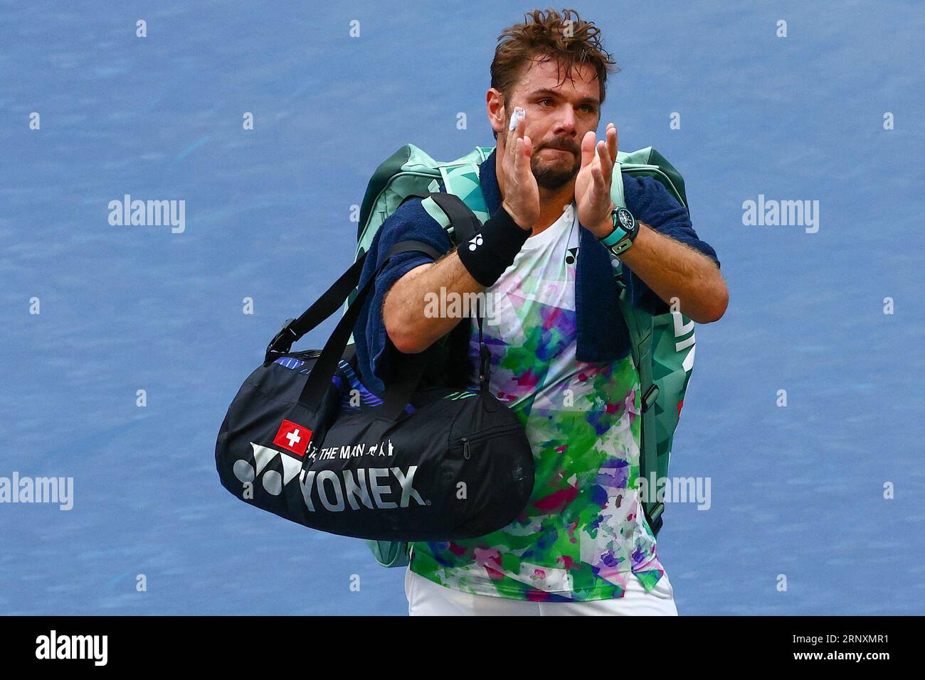 Stan Wawrinka, of Switzerland, reacts to the crowd as he walks off the court after losing to Jannik Sinner, of Italy, during the third round of the U.S