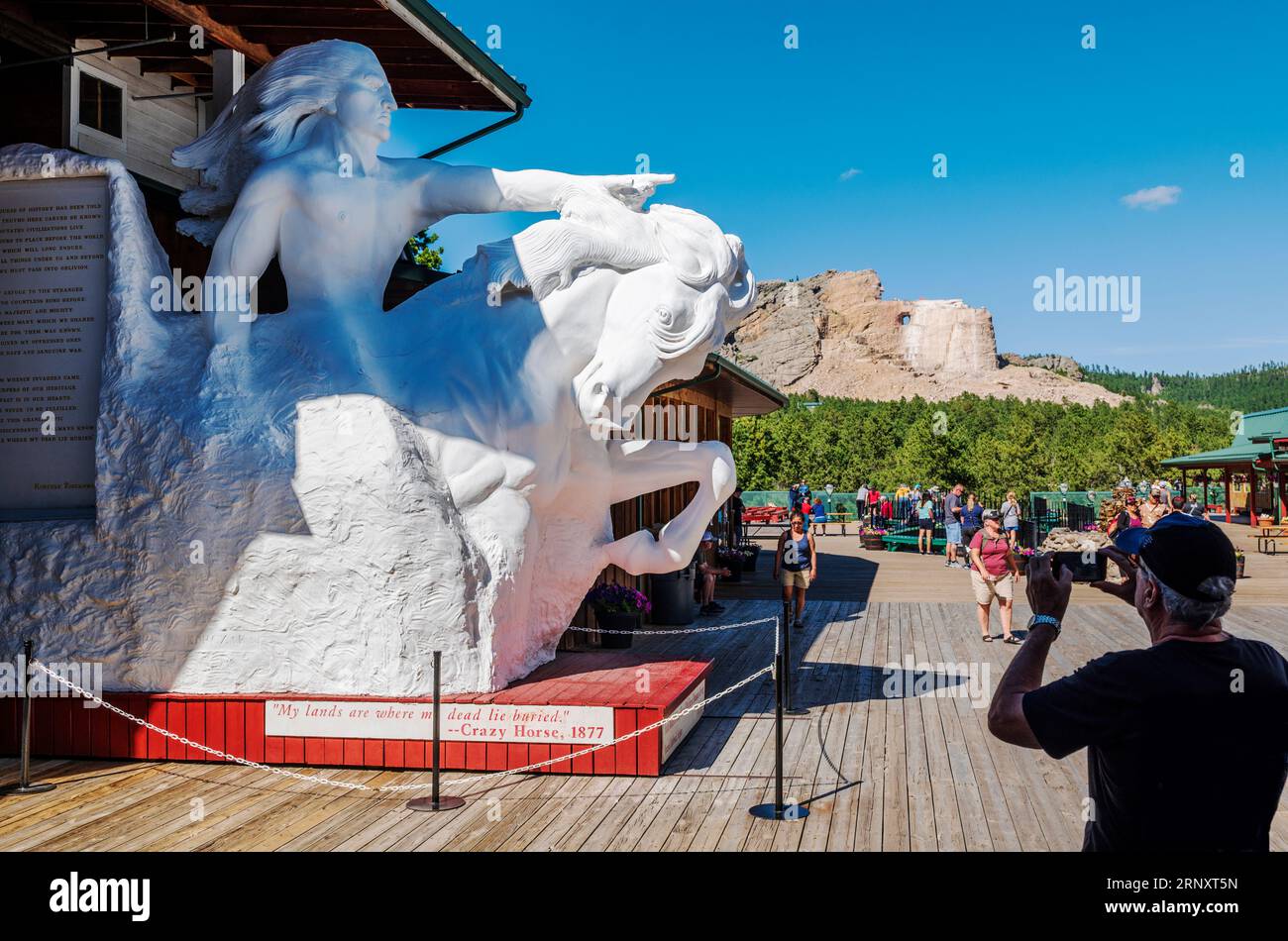 Scale model with Crazy Horse Memorial sculpture in background; Custer ...