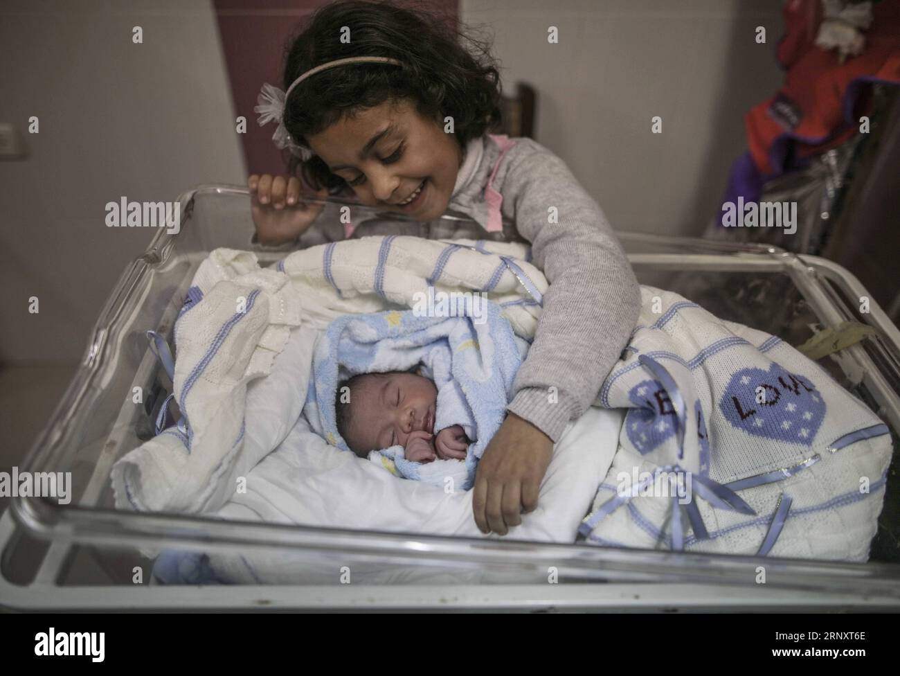 (180211) -- GAZA, Feb. 11, 2018 -- A Palestinian newborn baby is seen inside a hospital in Gaza City, on Feb. 11, 2018. The test-tube baby, named Mujahid, has been born with the smuggled sperm of his father who has been sentenced for seven years in Israeli jail. Many Palestinian women with husbands serving long terms in Israeli jails have resorted to sneaking sperm out and getting pregnant. ) MIDEAST-GAZA-SPERM SMUGGLING WissamxNassar PUBLICATIONxNOTxINxCHN Stock Photo
