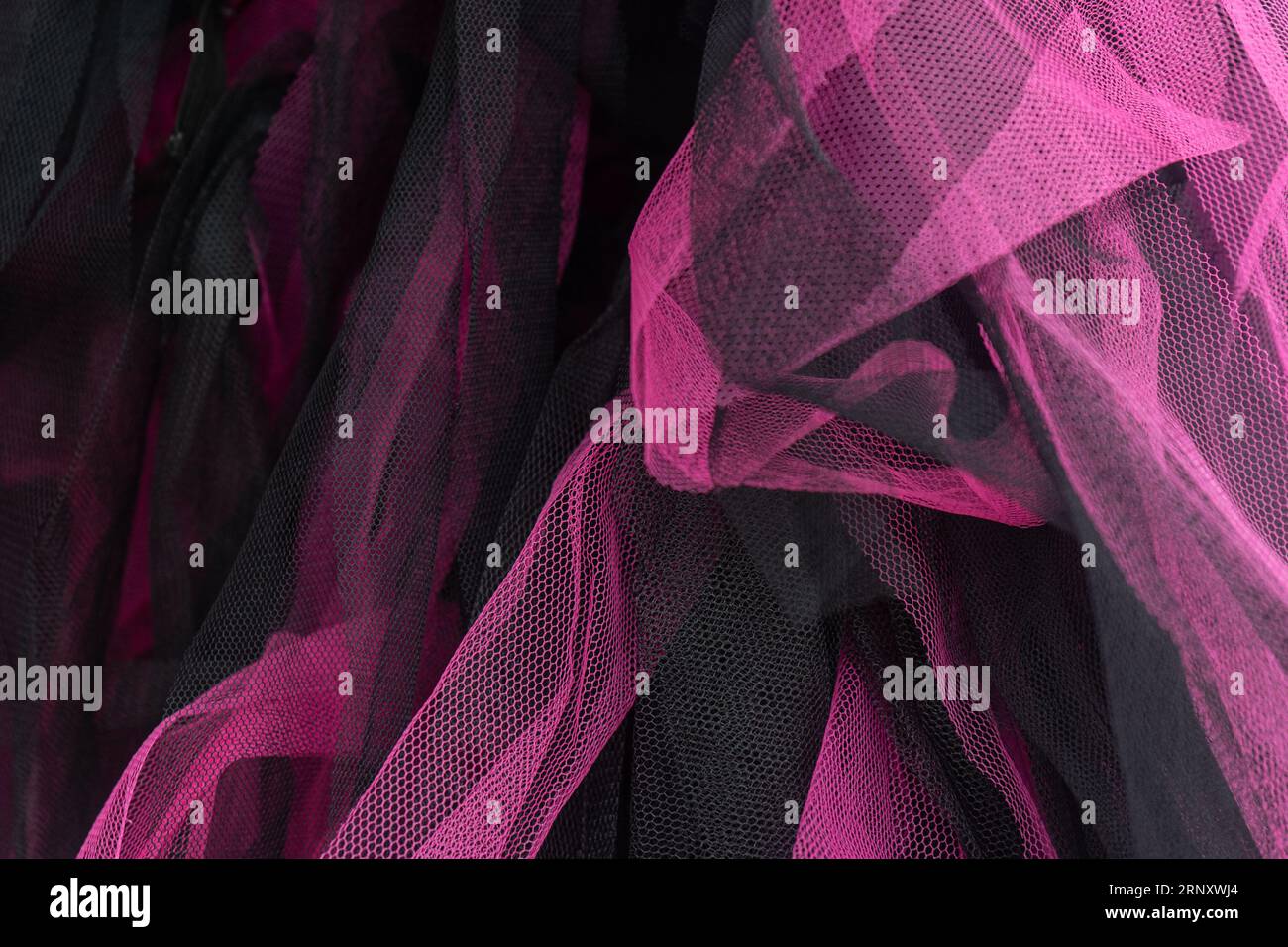 Tulle fabric in black and fuchsia Stock Photo