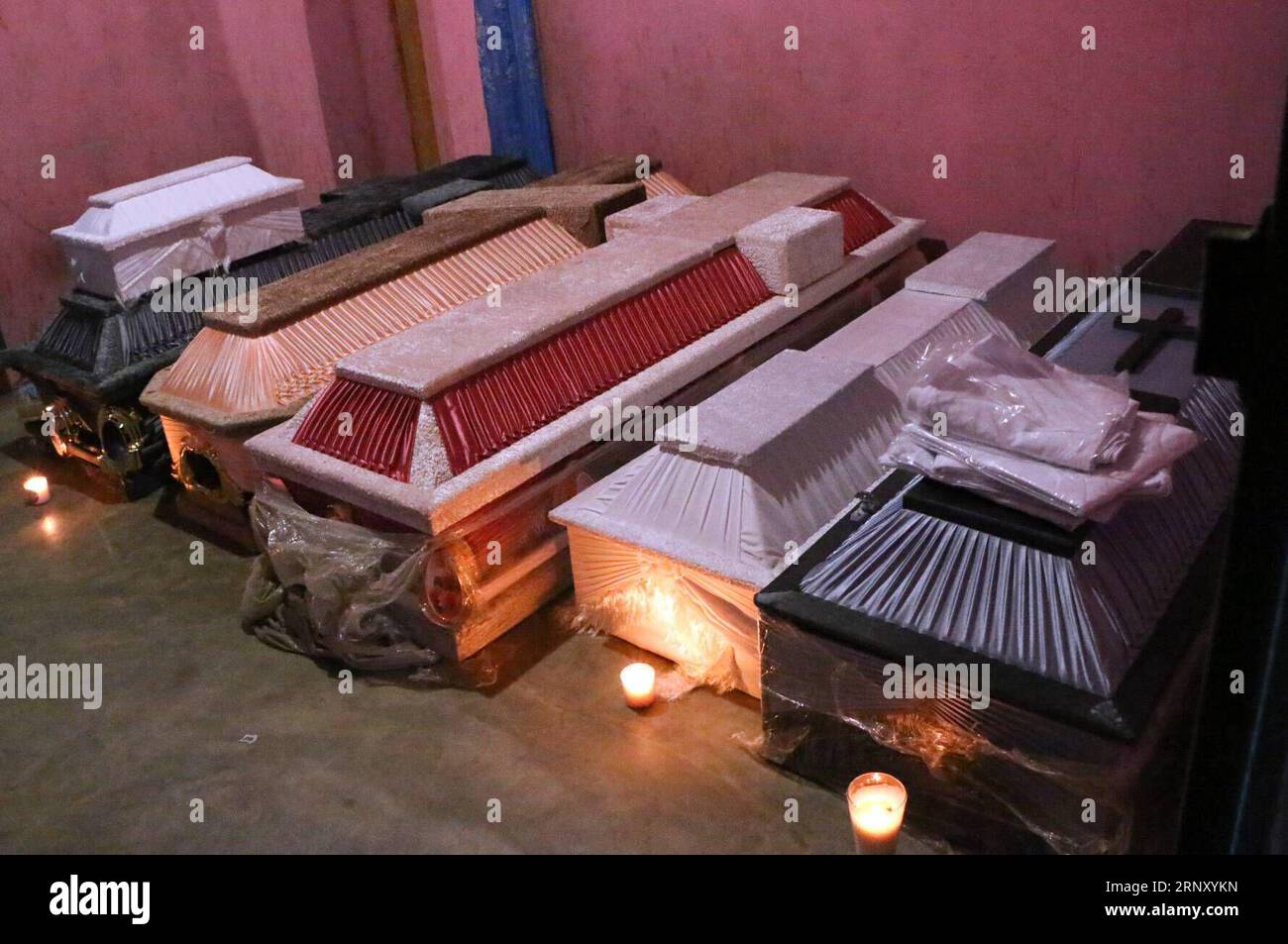 (180217) -- OAXACA (MOXICO), Feb. 17, 2018 -- Coffins of helicopter accident victims are seen in Santiago Jamiltepec of Oaxaca, Mexico, on Feb. 17, 2018. Thirteen people were killed after a military helicopter crashed on Friday in southern Mexico following an earthquake in the region, prosecutors in Oaxaca State said Saturday. The helicopter also carried Mexican Interior Minister Alfonso Navarrete and Governor of Oaxaca State Alejandro Murat, both of whom survived. ) (jg)(rtg) MEXICO-OAXACA-HELICOPTER-CRASH RebecaxMartinez PUBLICATIONxNOTxINxCHN Stock Photo