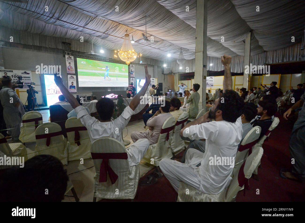 Peshawar, Peshawar, Pakistan. 2nd Sep, 2023. Pakistani cricket fans watch the live broadcast of the Asia Cup cricket match between Pakistan and India at the Pallekele International Cricket Stadium in Kandy, in Peshawar, Pakistan, 02 September 2023. (Credit Image: © Hussain Ali/ZUMA Press Wire) EDITORIAL USAGE ONLY! Not for Commercial USAGE! Stock Photo