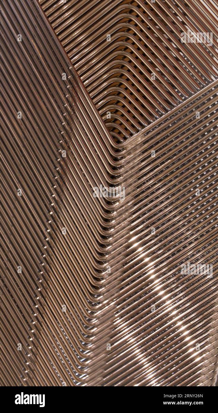 Stacked metal chairs Stock Photo