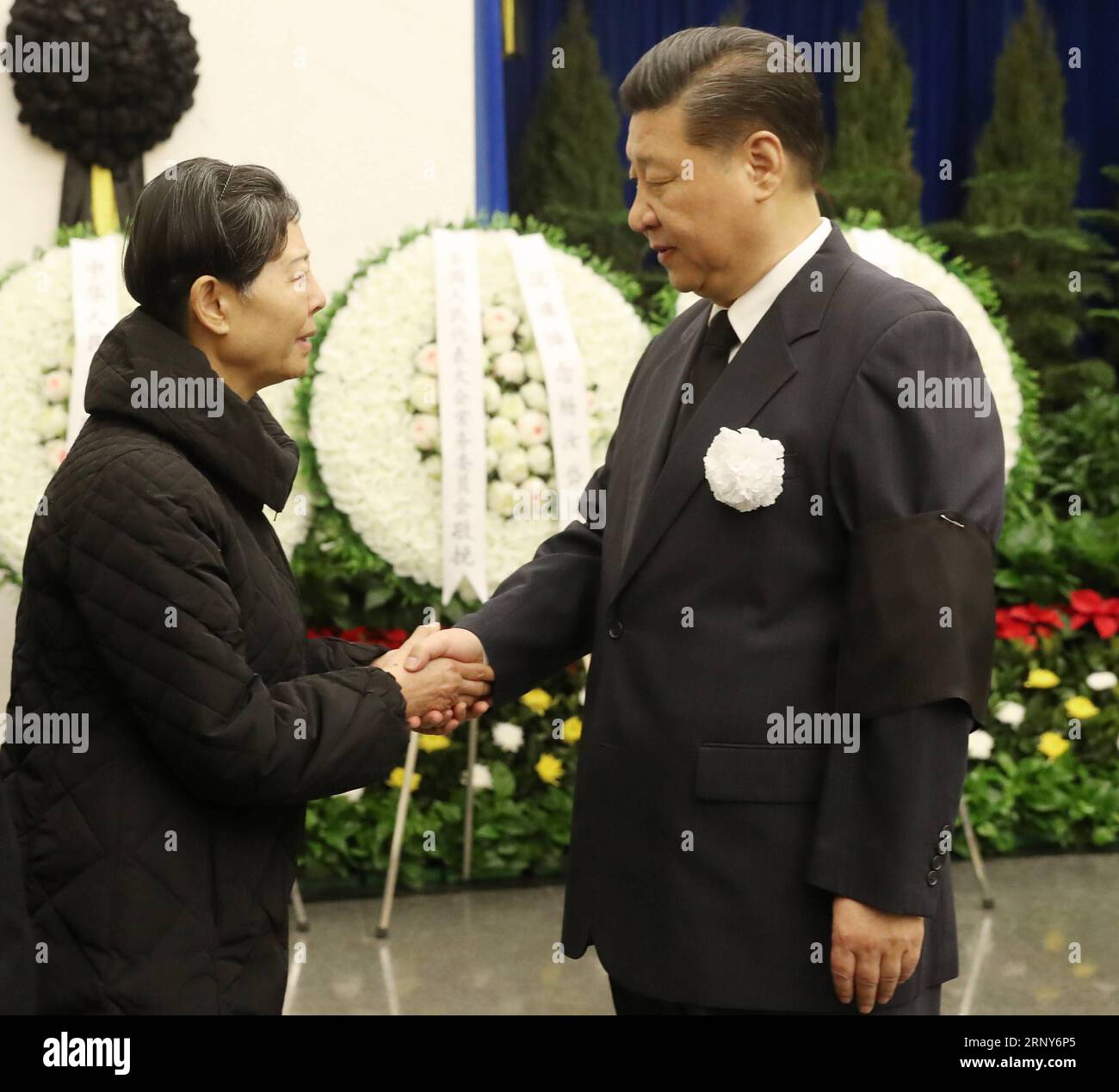 (180302) -- BEIJING, March 2, 2018 -- Chinese President Xi Jinping (R) shakes hands with a family member of Yang Rudai, former member of the Political Bureau of the Central Committee of the Communist Party of China (CPC), at the funeral of Yang at the Babaoshan Revolutionary Cemetery in Beijing, capital of China, March 2, 2018. Yang passed away due to illness at the age of 92 in Beijing on Feb. 24. Yang was also former vice chairman of the National Committee of the Chinese People s Political Consultative Conference and former secretary of the CPC Sichuan Provincial Committee. ) (ry) CHINA-BEIJ Stock Photo