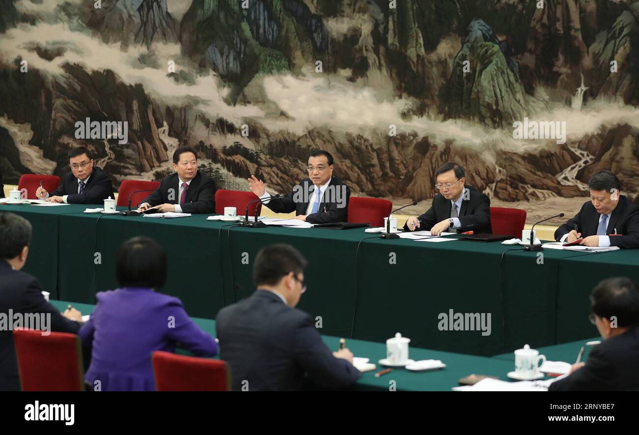 (180308) -- BEIJING, March 8, 2018 -- Chinese Premier Li Keqiang, who is also a member of the Standing Committee of the Political Bureau of the Communist Party of China (CPC) Central Committee, joins a panel discussion with the deputies from Liaoning Province at the first session of the 13th National People s Congress in Beijing, capital of China, March 8, 2018. ) (TWO SESSIONS)CHINA-BEIJING-LI KEQIANG-NPC-PANEL DISCUSSION (CN) JuxPeng PUBLICATIONxNOTxINxCHN Stock Photo