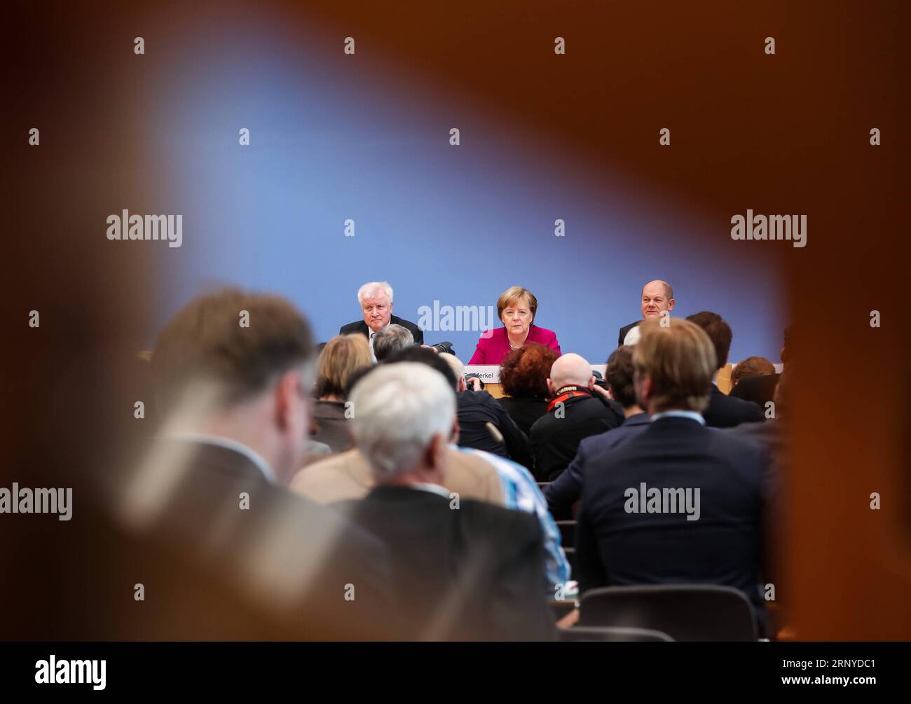 (180312) -- BERLIN, March 12, 2018 -- German Chancellor and Christian Democratic Union (CDU) leader Angela Merkel (C, rear), interim German Social Democrats (SPD) leader Olaf Scholz (R, rear) and Christian Social Union (CSU) leader Horst Seehofer (L, rear) attend a press conference in Berlin, capital of Germany, on March 12, 2018. The leaders of the Christian Democratic Union (CDU), Christian Social Union (CSU) and German Social Democrats (SPD) revealed the key priorities of Germany s new federal government on Monday. ) GERMANY-BERLIN-GRAND COALITION-AGREEMENT ShanxYuqi PUBLICATIONxNOTxINxCHN Stock Photo