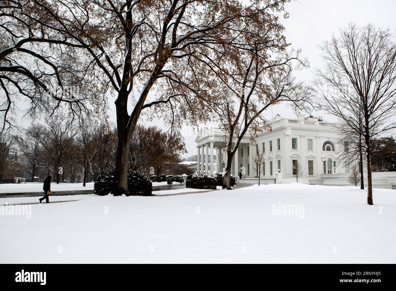 (180321) -- WASHINGTON, March 21, 2018 -- The North Lawn of the White House is covered with snow in Washington D.C., the United States, on March 21, 2018. A late-season nor easter, the fourth of its kind in three weeks, is targeting the northeast United States on Wednesday, bringing heavy snow and strong winds to the region. Washington, which is already snow-covered, is expected to see up to 6 inches of snow, as some models suggesting much high totals for the capital. Federal offices are closed for the snowstorm as the White House announced early Wednesday that all public events for the day we Stock Photo