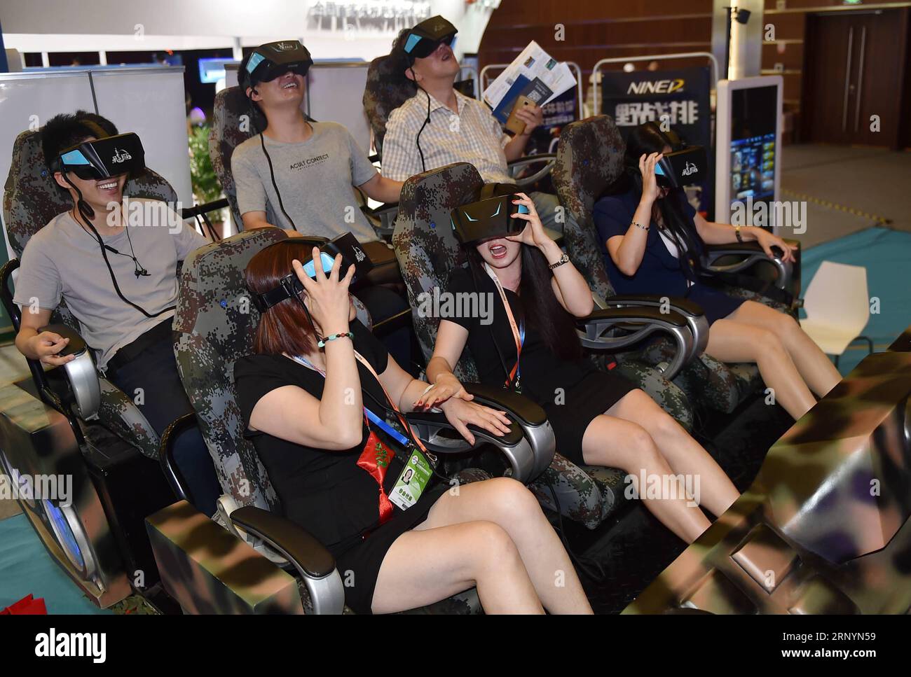 (180327) -- BEIJING, March 27, 2018 -- Visitors try out virtual reality (VR) devices at Beijing International Fair for Trade in Services in Beijing, capital of China, May 28, 2017. The Beijing International Fair for Trade in Services was held from May 28 to June 1, 2017, aiming at encouraging the opening up and cooperation of the service trade. A huge trade deficit with China is reportedly behind the U.S. administration s plan to slap tariffs on up to 60 billion U.S. dollars of Chinese imports and restrict Chinese investment. But data sometimes lies, and could shield the bigger picture.) (djj) Stock Photo