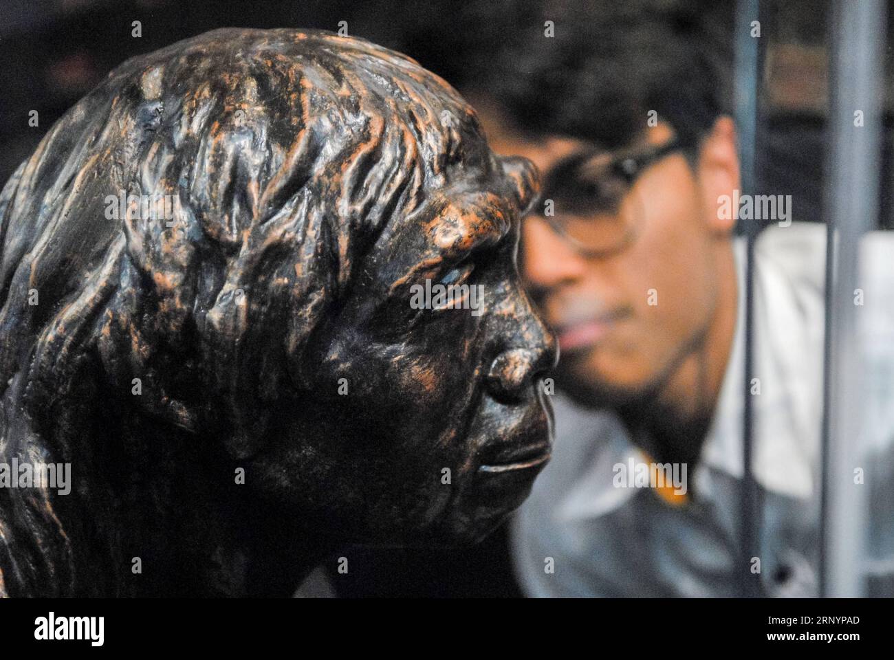 Poking Man (180329) -- KUALA LUMPUR, March 29, 2018 -- A man looks at a displayed ...