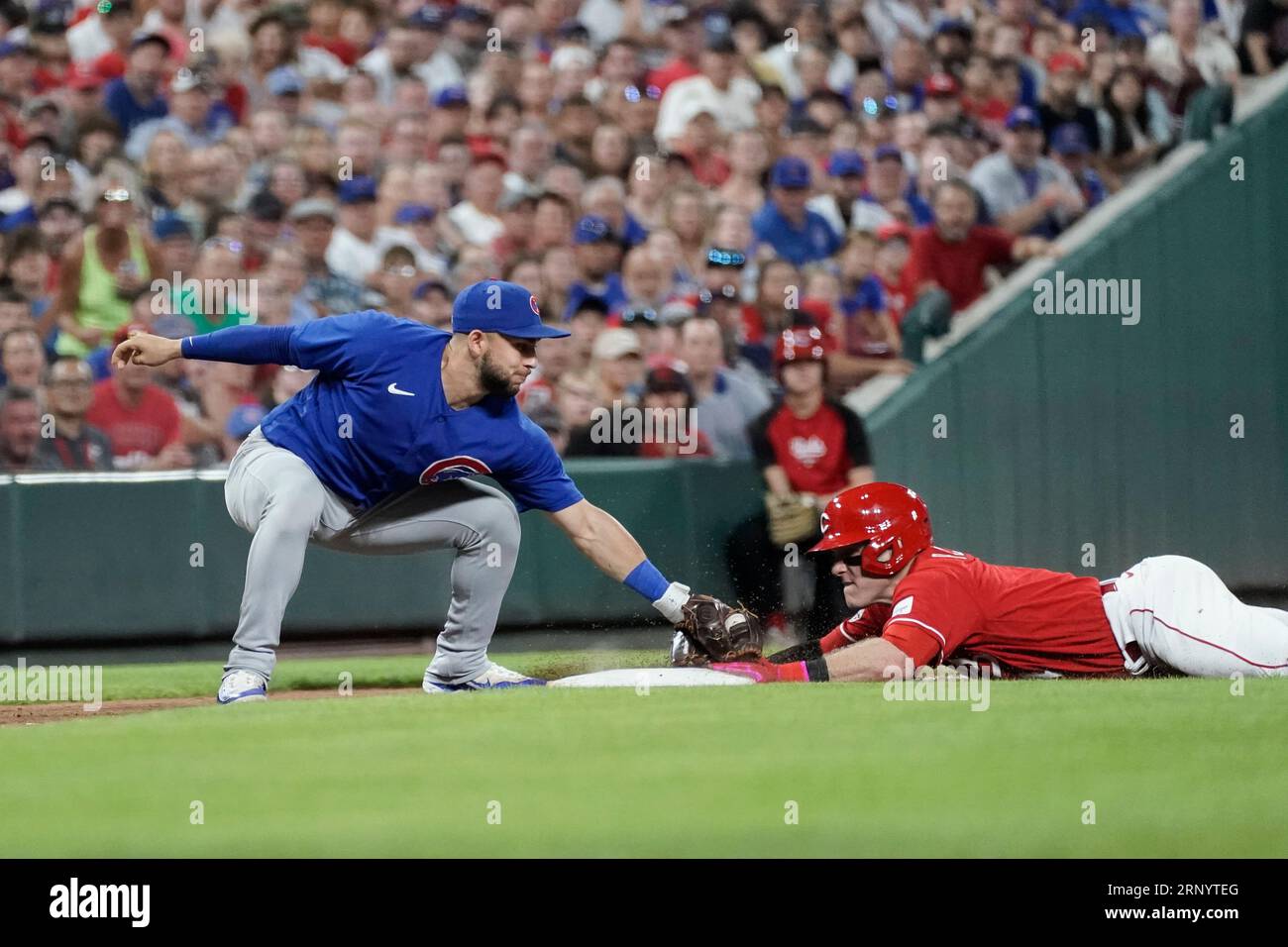 Chicago Cubs' Nick Madrigal, right, slides into second base next to San  Francisco Giants second baseman Thairo Estrada after Cubs' Seiya Suzuki  walked during the first inning of a baseball game in