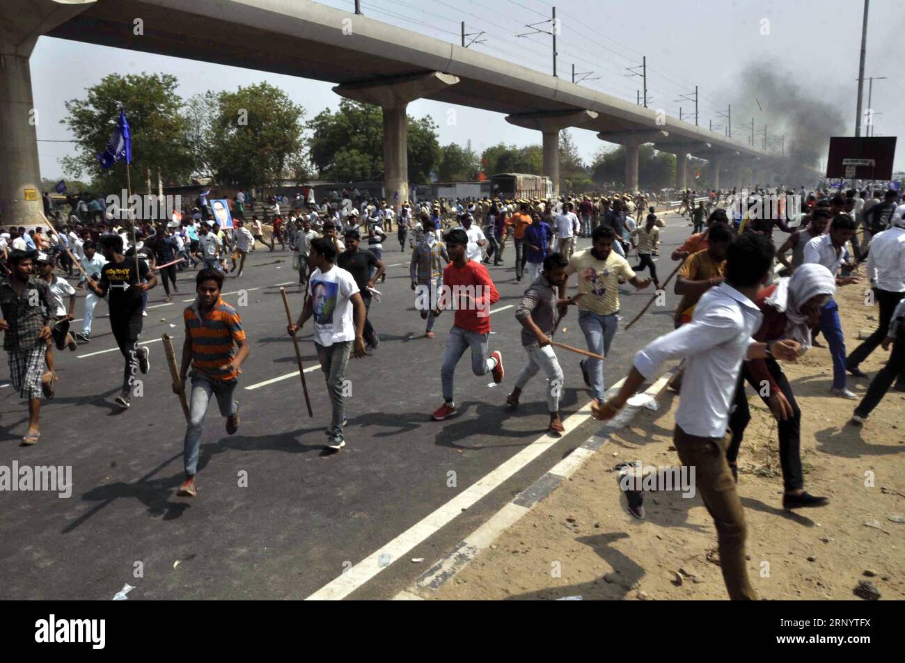 (180403) -- FARIDABAD, April 3, 2018 -- Dalit protestors clash with police in Faridabad, around 55 kilometers from Delhi, India, April 2, 2018. At least six people died and six others were injured in clashes with police Monday as India s Dalits protested against the Supreme Court s alleged dilution of a law ensuring the community s protection. ) (gj) INDIA-FARIDABAD-DALIT-STRIKE Stringer PUBLICATIONxNOTxINxCHN Stock Photo