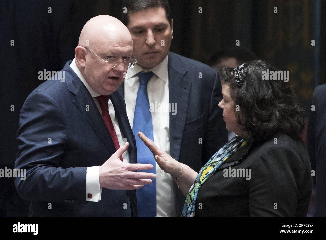 (180414) -- UNTIED NATIONS, April 14, 2018 -- British Ambassador to the United Nations Karen Pierce (R front) talks to Russian Ambassador to UN Vassily Nebenzia(L front) before a Security Council emergency meeting on Syria at the UN headquarters in New York, April 14, 2018. A Russian-drafted resolution, which would have condemned the military strikes on Syria carried out by the United States, France and Britain, failed to be adopted by the Security Council. ) UN-SECURITY COUNCIL-SYRIA-DRAFT RESOLUTION-FAILING LixMuzi PUBLICATIONxNOTxINxCHN Stock Photo