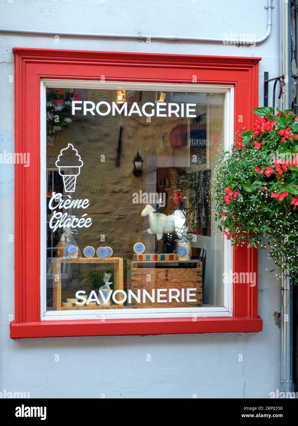 Window of a shop that sells cheese and soap in the old City of Quebec. Stock Photo