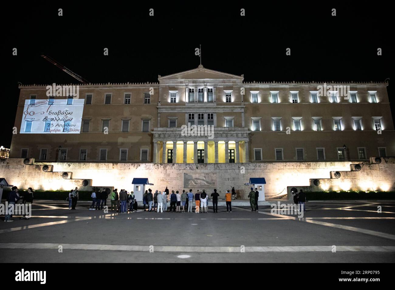(180423) -- ATHENS, April 23, 2018 -- Photo taken on April 23, 2018 shows a cartoon image projected on the parliament building to celebrate Athens taking over as World Book Capital for 2018 in Athens, Greece. Athens marked World Book Day on Monday with a celebratory event hosted at the Acropolis Museum, as it took over as World Book Capital for 2018. ) GREECE-ATHENS-WORLD BOOK CAPITAL 2018-WORLD BOOK DAY LefterisxPartsalis PUBLICATIONxNOTxINxCHN Stock Photo