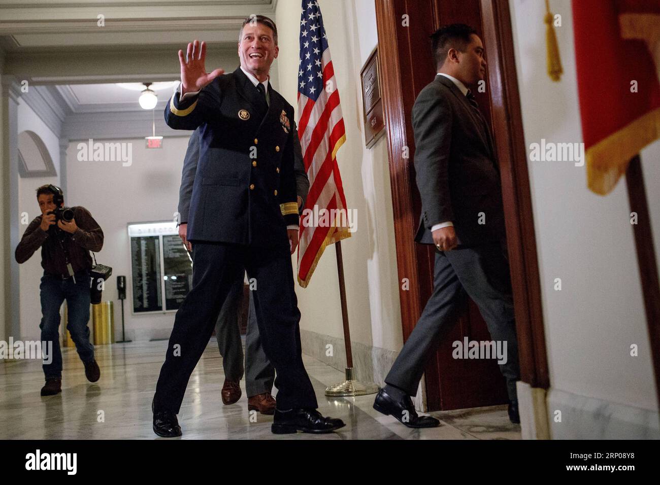 Bilder des Tages 180426 -- WASHINGTON, April 26, 2018 -- Veterans Affairs Secretary nominee Ronny Jackson L, front is seen on Capitol Hill in Washington D.C., the United States, on April 16, 2018. White House physician Ronny Jackson announced on April 26 that he had withdrawn from President Donald Trump s nomination to be the next Veterans Affairs Secretary, in the wake of a series of allegations that he had fostered a hostile work environment and behaved improperly while serving as the top doctor in the White House.  U.S.-WASHINGTON D.C.-VETERANS AFFAIRS SECRETARY-NOMINEE-WITHDRAWAL TingxShen Stock Photo