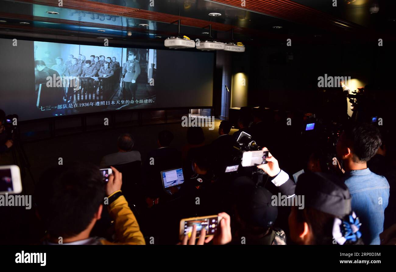 (180507) -- CHANGCHUN, May 7, 2018 -- Members of the press watch a documentary on confession from Imperial Japanese Army (IJA) war criminals during the 1949 Khabarovsk War Crimes Trials, which has been newly acquired by the Museum of the Imperial Palace of Machukuo , in Changchun, northeast China s Jilin Province, May 7, 2018. The 22-hour-long audio record, provided by a Russian state-level audio archive, reveals the germ warfare atrocities of IJA s clandestine Unit 731 and Unit 100 in China. ) (lmm) CHINA-CHANGCHUN-IMPERIAL JAPANESE ARMY-WAR CRIME-RECORD (CN) LinxHong PUBLICATIONxNOTxINxCHN Stock Photo