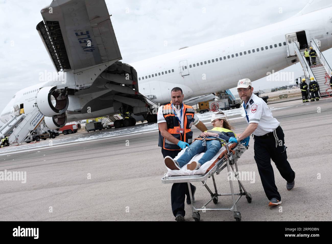 (180508) -- TEL AVIV, May 8, 2018 -- People take part in the Pelican emergency drill at Ben Gurion International Airport near Tel Aviv, Israel, on May 8, 2018. Ben Gurion International Airport carried out on Tuesday a large scale emergency drill simulating an emergency landing by a Boeing 747-400 jumbo jet carrying hundreds of passengers. Around 1,000 representatives of the airport, the defense and health ministries, the air force, police, emergency services and the IDF Home Front Command took part in the drill. ) (zxj) ISRAEL-TEL AVIV-AIRPORT-EMERGENCY DRILL TomerxNeuberg-JINI PUBLICATIONxNOT Stock Photo