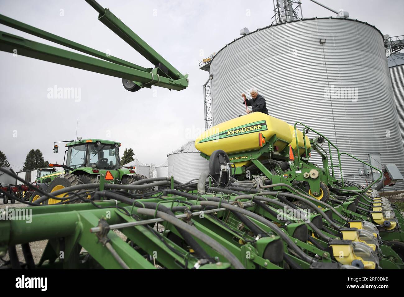 (180509) -- IOWA, May 9, 2018 -- Rick Kimberley checks a farming combine machine at his farm near Des Moines, capital of Iowa State, May 3, 2018. Rick and his son, Grant, grow more than 4,000 acres of corn and soybeans with a couple of hired hands and massive combines whose computers precisely track yield, moisture and other key statistics for each row and acre. He has been to China 15 times in recent years to talk about precision farming and other tricks of his trade, becoming an ambassador for modern farming methods in China. As for the current trade tensions between the United States and Ch Stock Photo