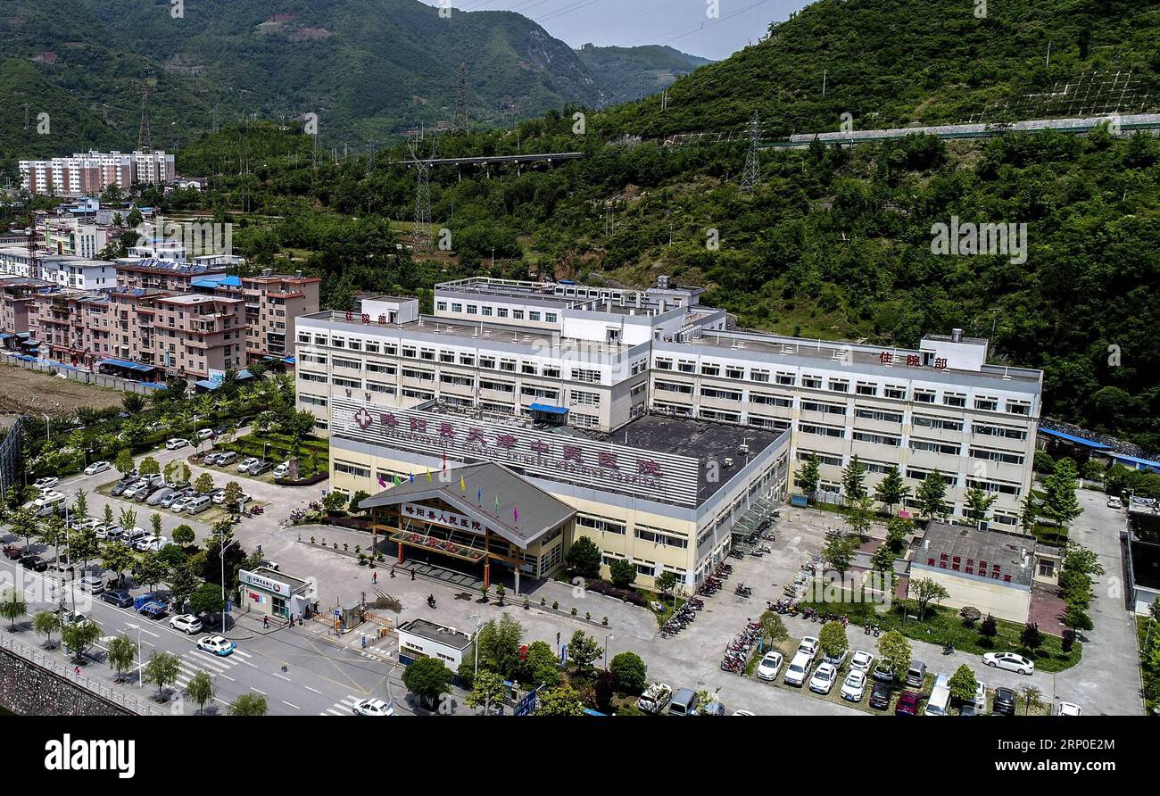 (180509) -- HANZHONG, May 9, 2018 -- Aerial photo taken on April 27, 2018 shows a newly-built hospital in Lueyang County of Hanzhong City, northwest China s Shaanxi Province. On May 12, 2008, the 8.0-magnitude earthquake, which centered in southwestern Sichuan s Wenchuan County, severely affected parts of neighboring Shaanxi s Hanzhong City in northwest China, causing different degrees of damages to buildings, road traffic and other infrastructures in these areas. After ten years of active reconstruction, a new Hanzhong has risen from the earthquake ruins and takes on a new look now. ) (sxk) C Stock Photo