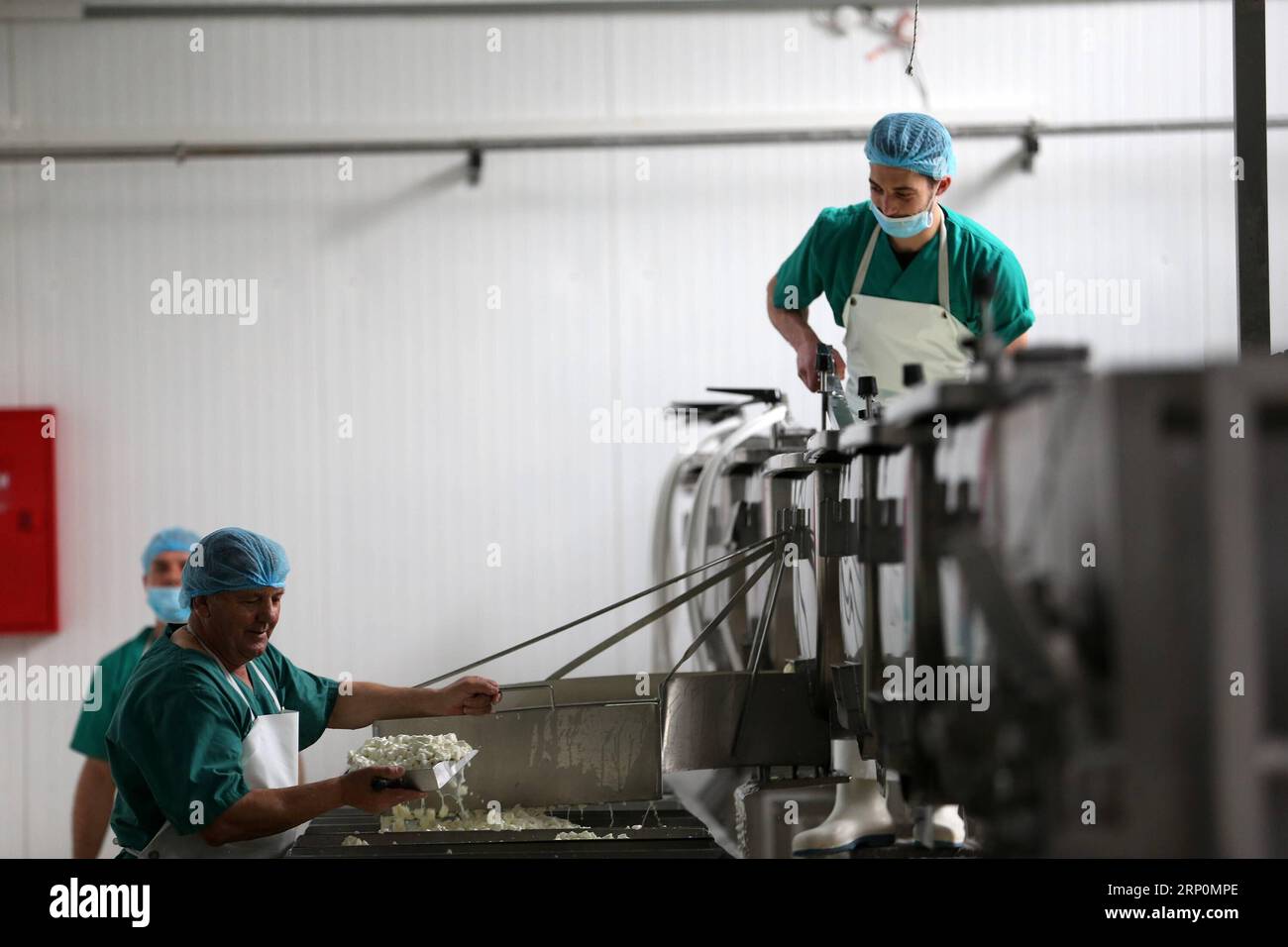 (180519) -- CORINTH, May 19, 2018 -- People work at a cheese factory in Kalliani village of Corinth, some about 70 Km west of Athens, Greece, on May 16, 2018. In the highlands of Corinth prefecture at the Peloponnese peninsula, just two hours from Athens, local agricultural small businesses turn to extroversion to survive the economic crisis. To go with Feature: Greek agricultural community more extrovert in seeking business opportunities. ) (dtf) GREECE-CORINTH-AGRICULTURAL-EXTROVERSION MariosxLolos PUBLICATIONxNOTxINxCHN Stock Photo