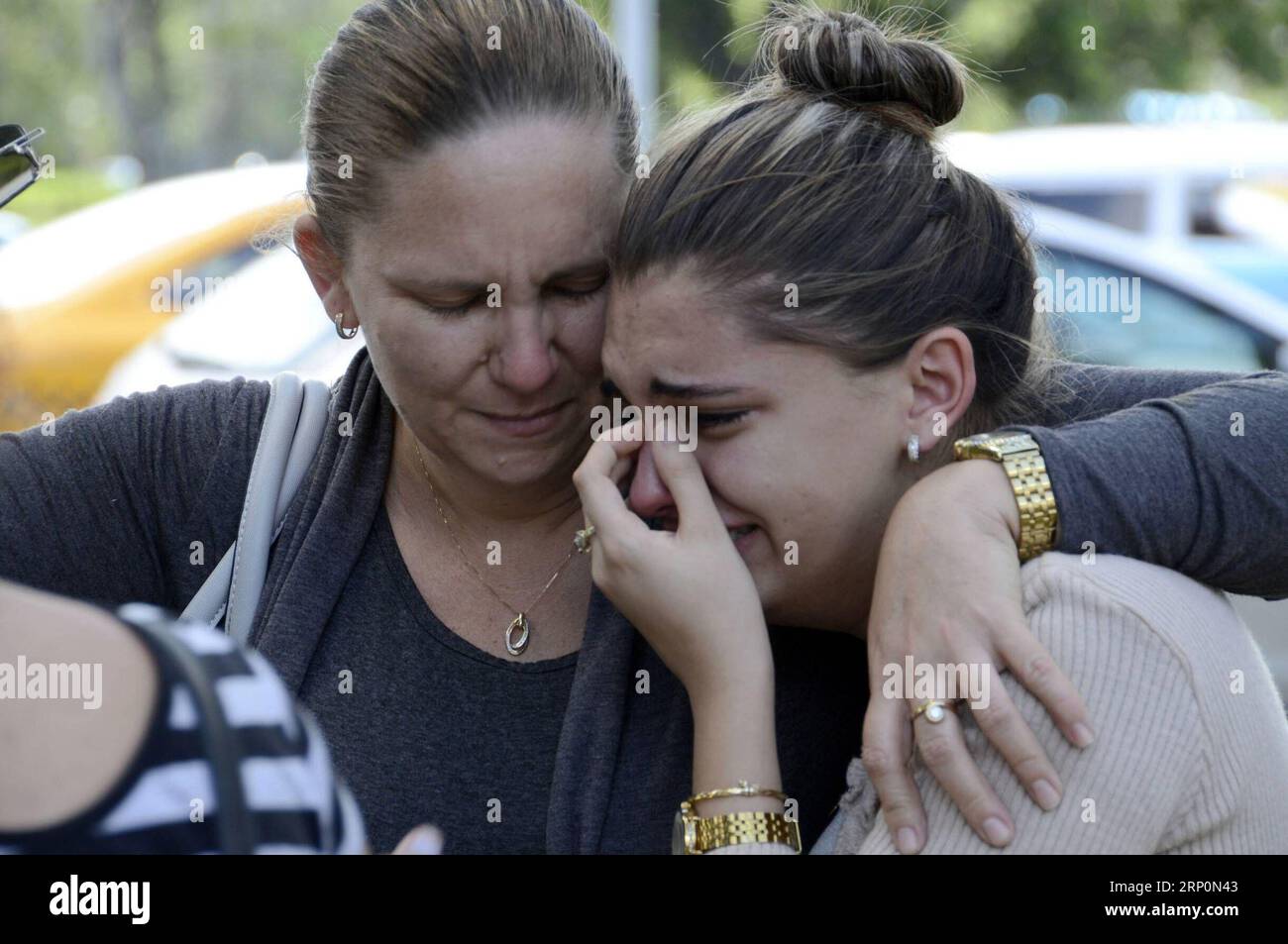 (180519) -- HAVANA, May 19, 2018 -- Relatives of the victims of the airplane crash weep outside the Institute of Legal Medicine of Havana in Havana, Cuba, on May 19, 2018. Cuba confirms here on Saturday that 110 were dead from Friday s Boeing 737 crash close to Havana s Jose Marti International Airport. ) CUBA-HAVANA-AIRPLANE-CRASH JoaquinxHernandez PUBLICATIONxNOTxINxCHN Stock Photo
