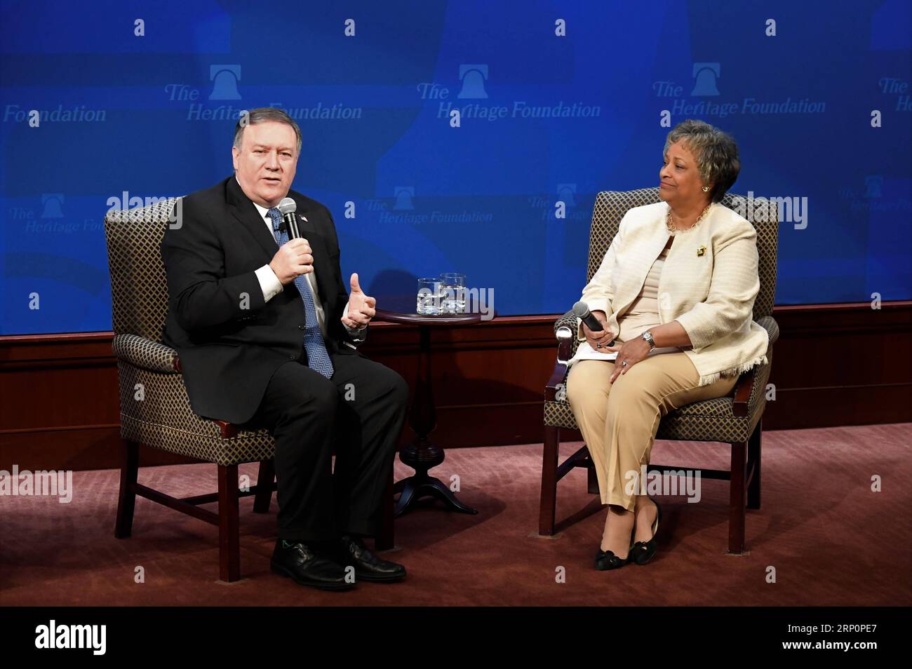 (180521) -- WASHINGTON, May 21, 2018 -- U.S. Secretary of State Mike Pompeo (L) discusses U.S. policy after withdrawing from Iran nuclear deal with Kay Coles James, President of the Heritage Foundation, in Washington D.C., the United States, on May 21, 2018. Mike Pompeo on Monday chastised Iran for its nuke and missile programs, vowing to issue Tehran the toughest sanctions in history if it does not change course. ) U.S.-WASHINGTON D.C.-POMPEO-IRAN-SPEECH YangxChenglin PUBLICATIONxNOTxINxCHN Stock Photo