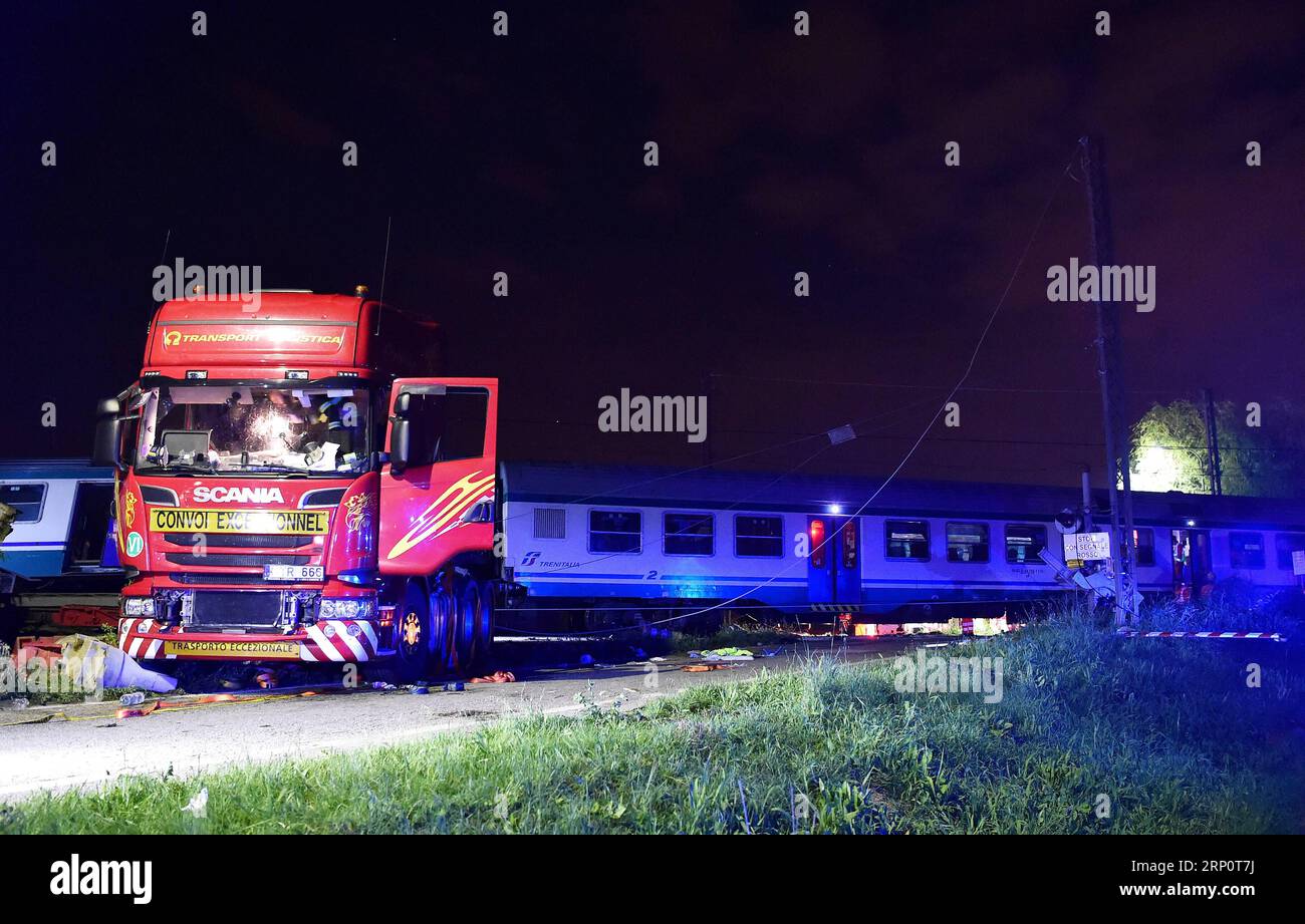 (180524) -- ROME, May 24, 2018 () -- Rescuers work at the site where a regional train crashed into a heavy goods vehicle on a railway line connecting the cities of Turin and Ivrea, Italy, on May 24, 2018. At least two people died and eighteen were injured in a train accident in the northwest Piedmont region of Italy, the country s emergency authorities said on Thursday. () (lrz) ITALY-TRAIN ACCIDENT Xinhua PUBLICATIONxNOTxINxCHN Stock Photo