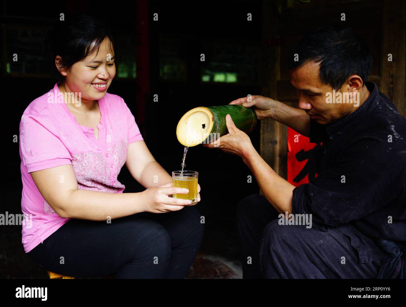180531) &ndash; GUILIN, May 31, 2018 &ndash; Villagers taste bamboo wine at 